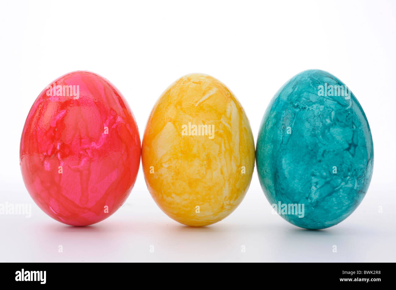 line of colored easter eggs isolated on white background Stock Photo ...