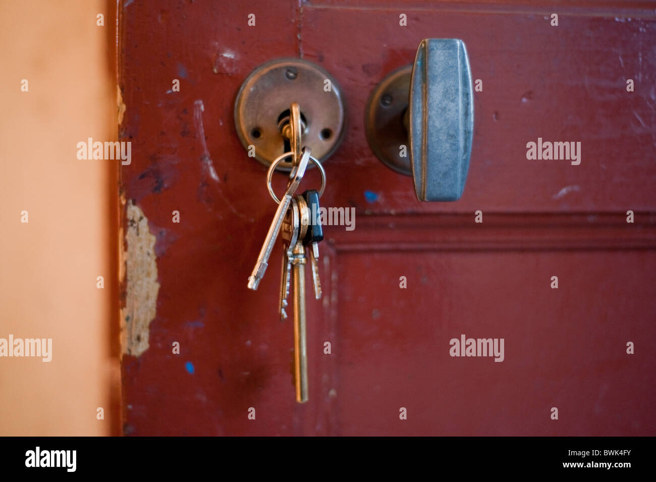Paris, France,, Keys, on Keychain in Old Wooden Door Lock Stock Photo