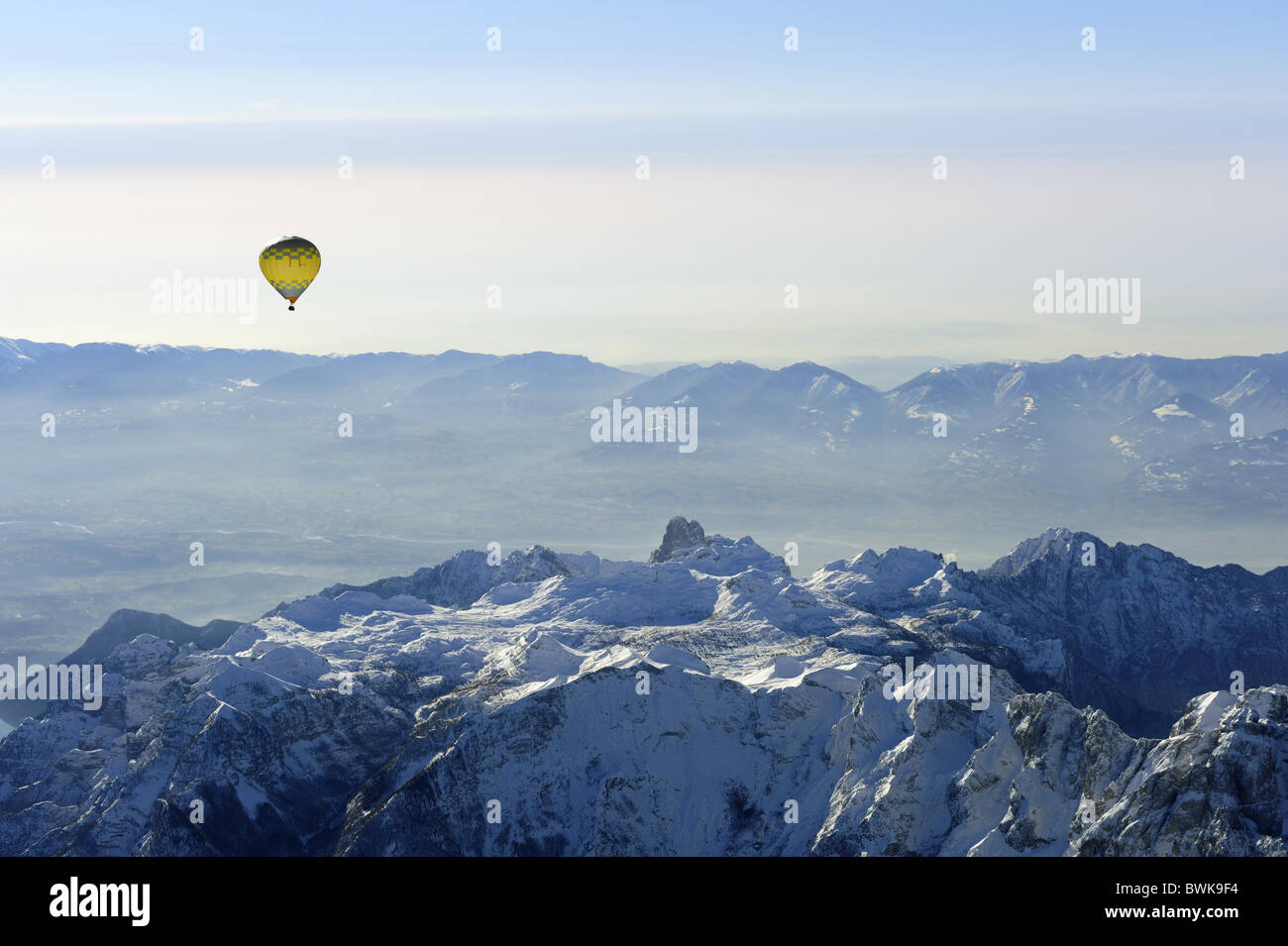 Hot-air balloon flying high above Belluno Dolomites and valley of Piave, aerial photo, Dolomites, Venetia, Italy, Europe Stock Photo
