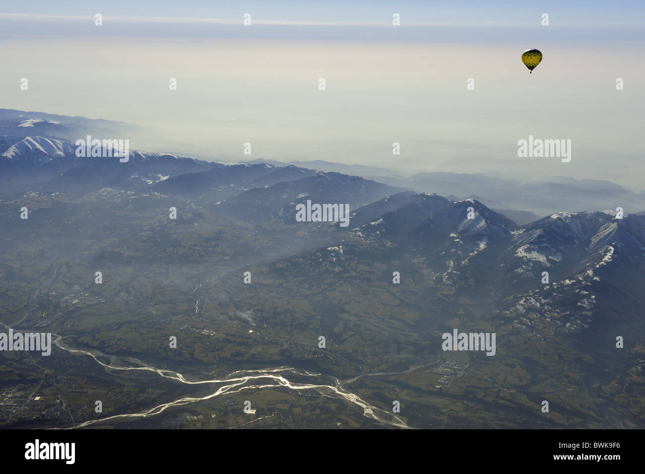 Hot-air balloon flying high above valley of Piave and Nevegal range, aerial photo, valley of Piave, Dolomites, Venetia, Italy, E Stock Photo