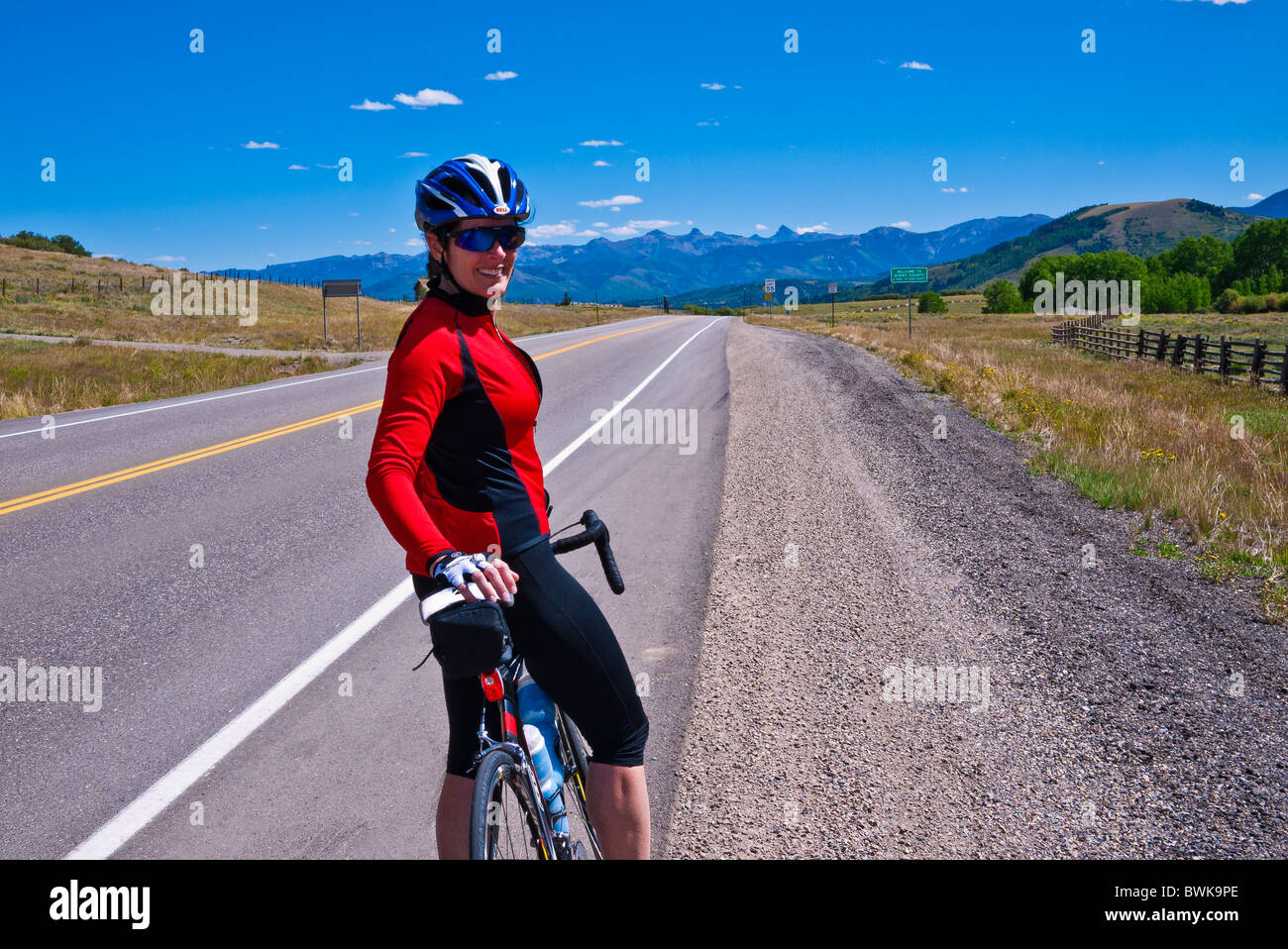 Cyclist on the San Juan Skyway (Highway 62)at Dallas Divide, Uncompahgre National Forest, Colorado Stock Photo