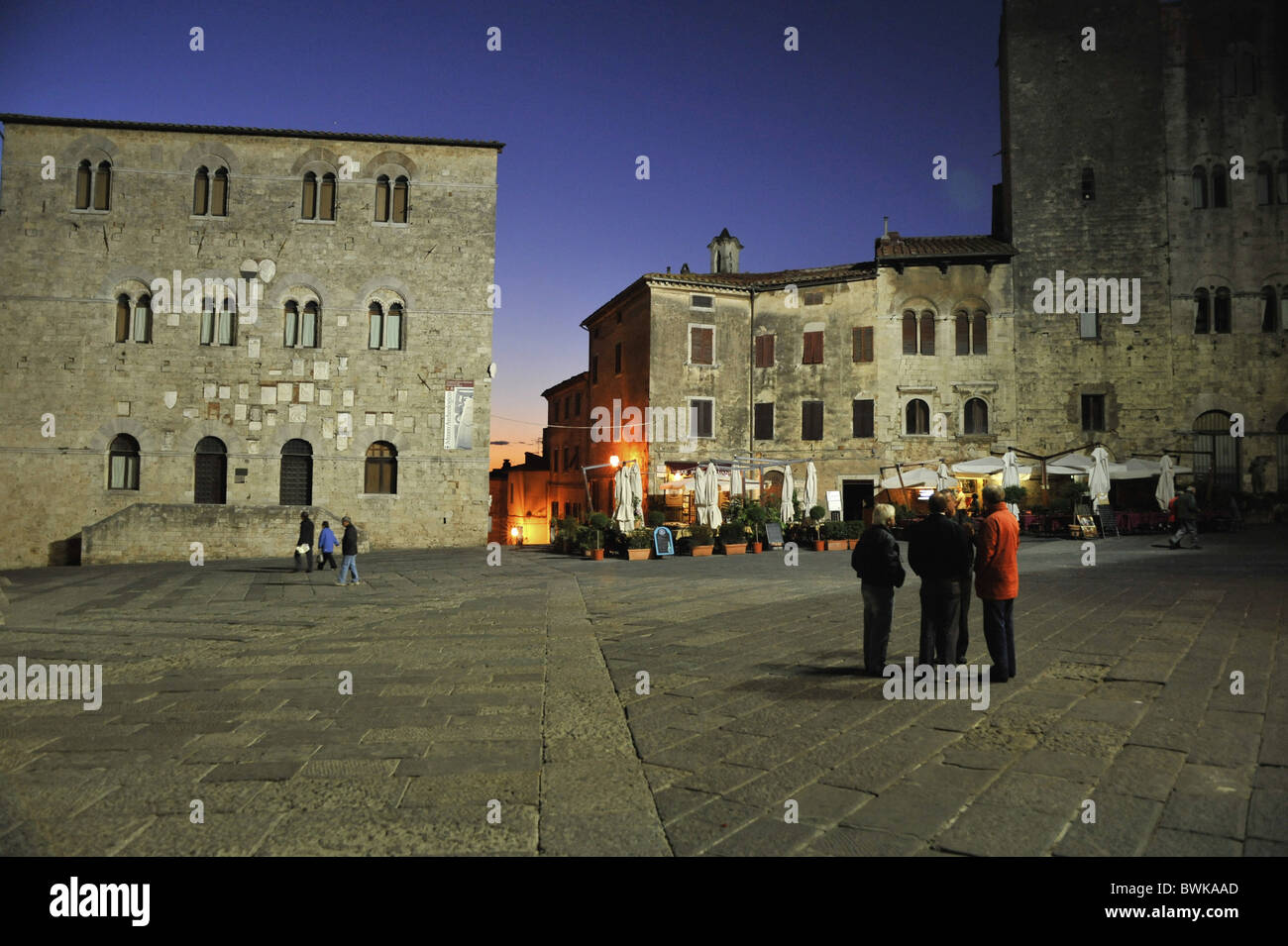 People at Piazza Garibaldi in the evening, Massa Marittima, Province ...