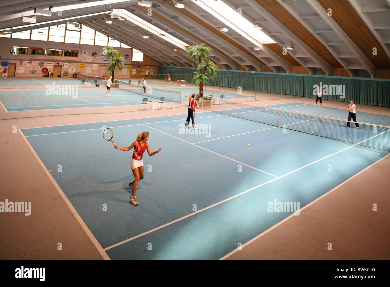 covered court Inside course lesson training tennis hall Halle sports leisure sport person tennis fields pl Stock Photo