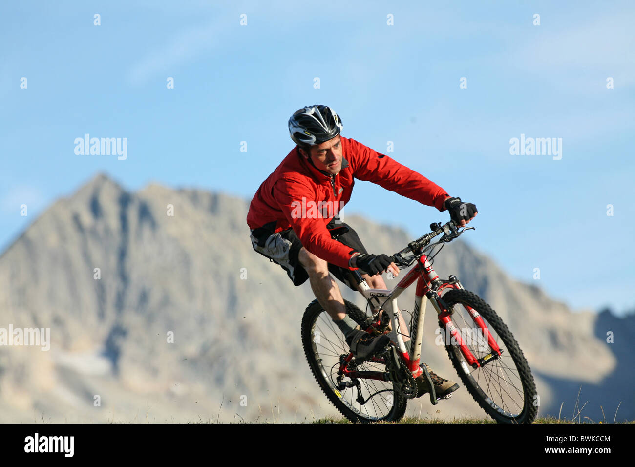 man singles action mountain biker biking biking bicycle bike biking bicycle riding a bike cyclist MTB mou Stock Photo