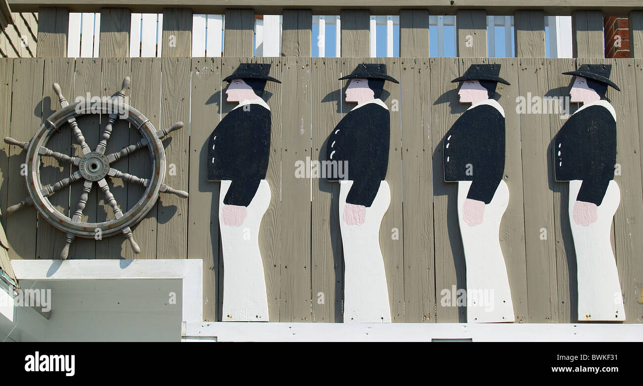 Sailors and ship wheel cutout at Rockport,Massachusetts Stock Photo