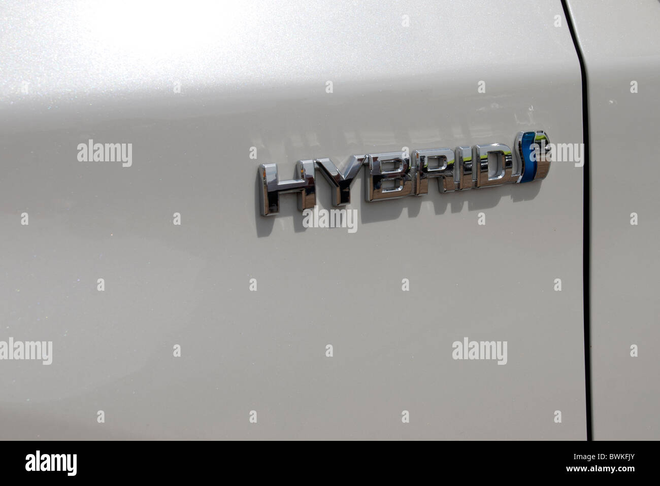 hybrid logo on the side of a car. Stock Photo