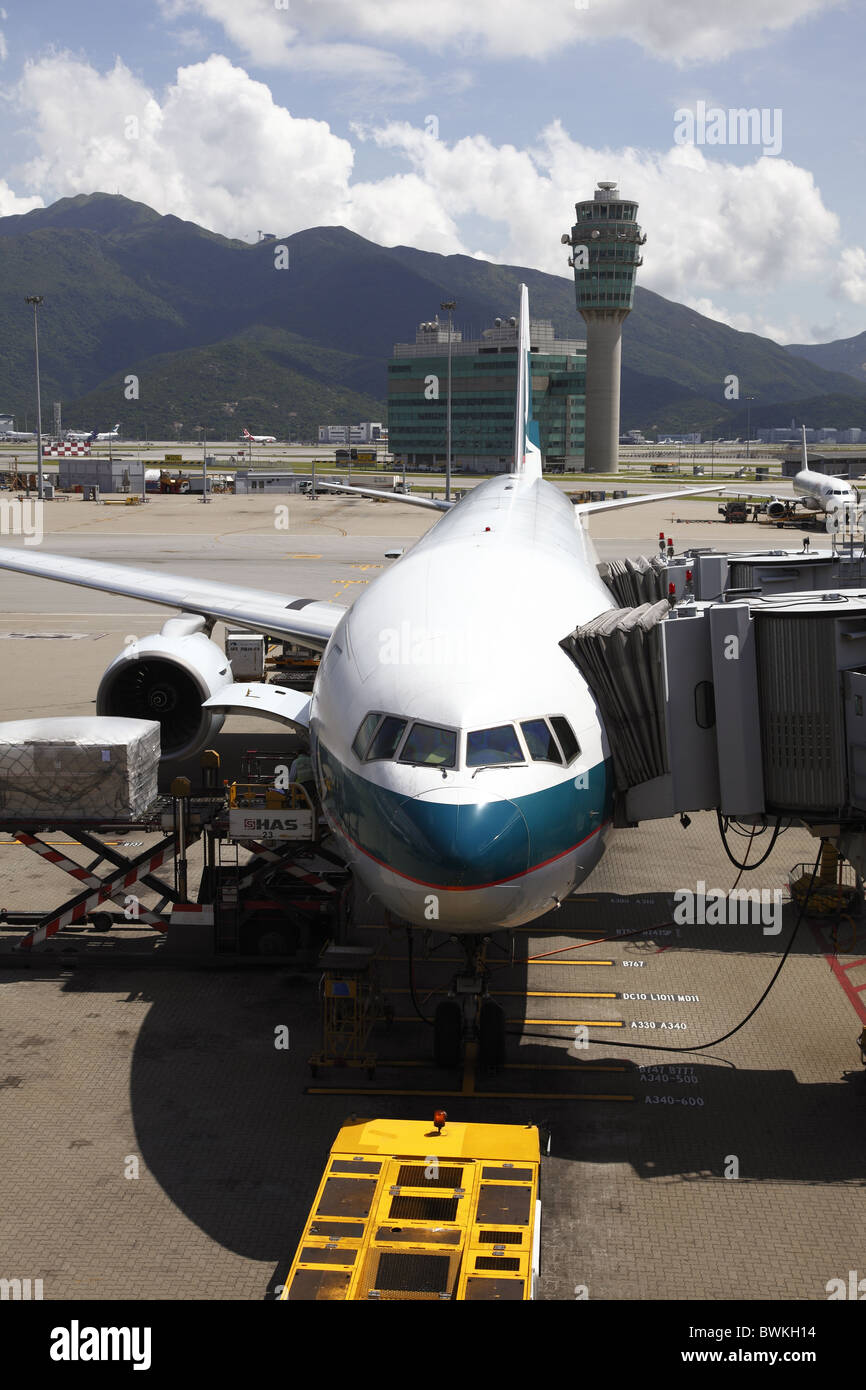 China, Hong Kong International Airport at Chek Lap Kok, Cathay Pacific Boeing 777 Docked at Terminal Stock Photo
