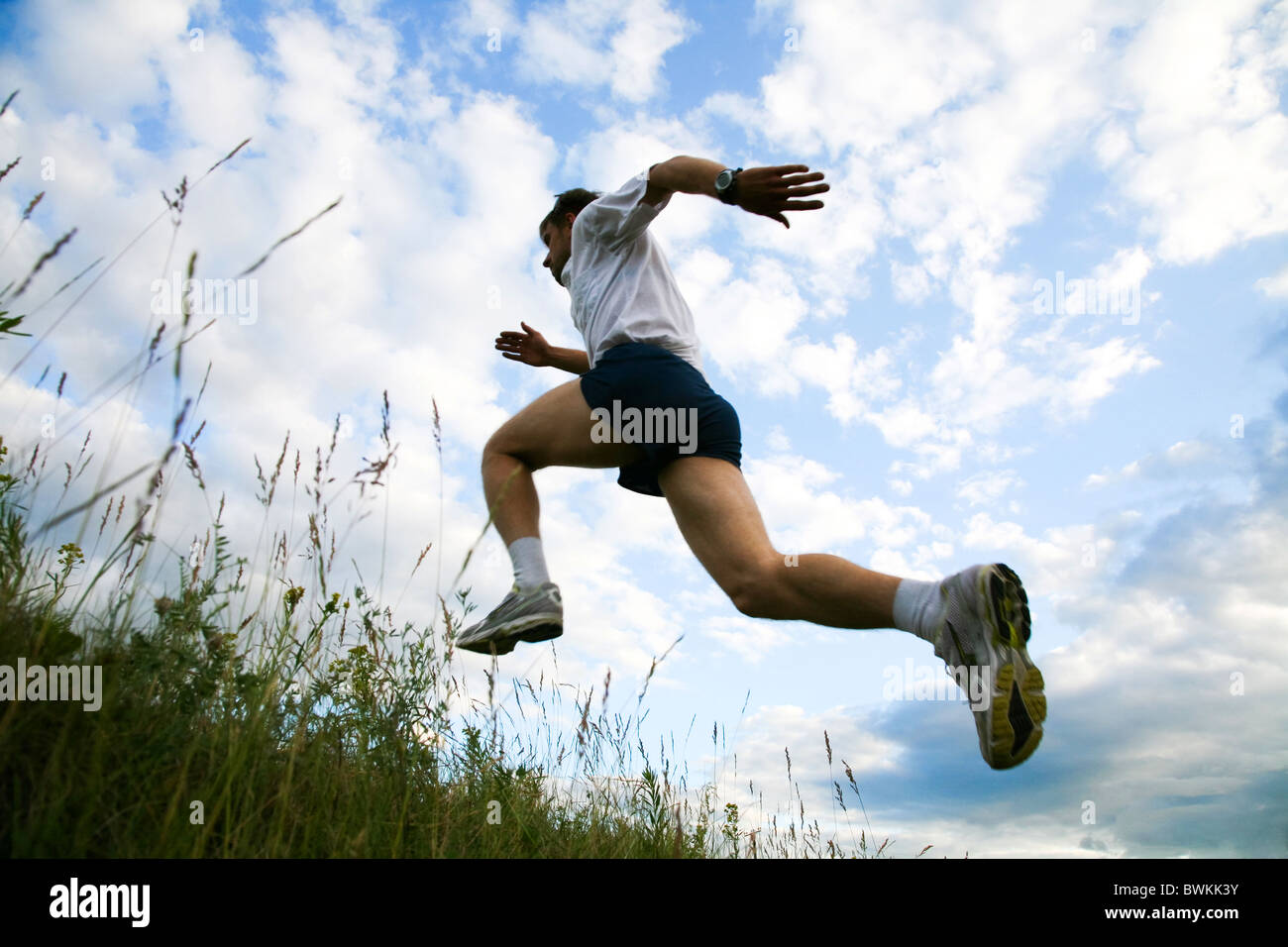 Rear view of energetic man practicing on open air Stock Photo