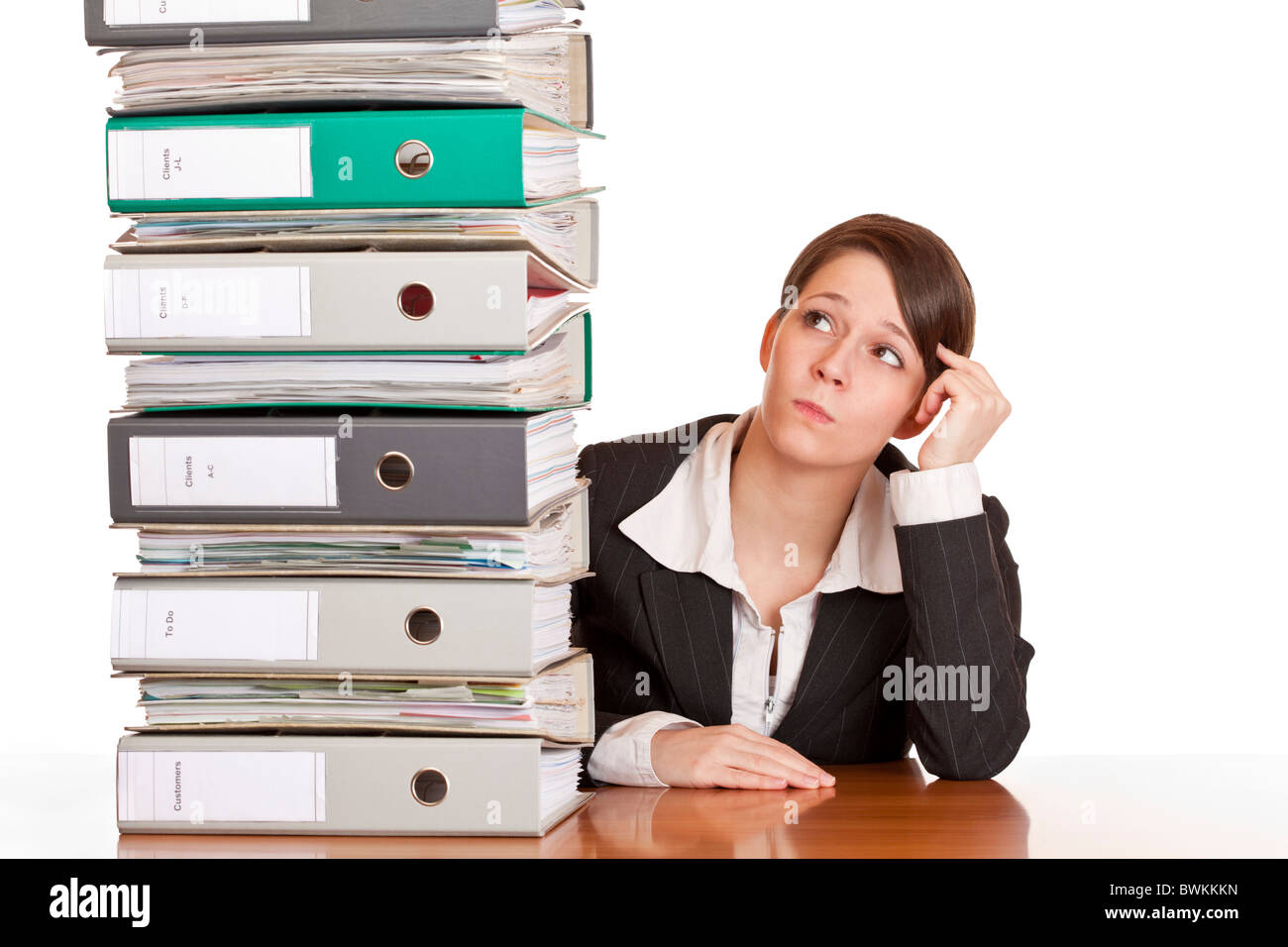 Business woman thinks about solving problem with folder stack. Isolated ...