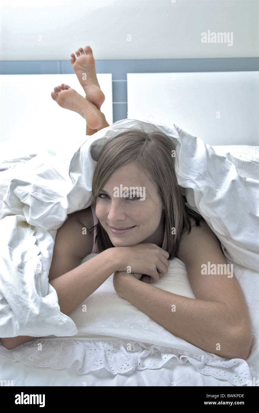 woman Inside portrait relaxed recumbent lie lying bedroom bed bed rest