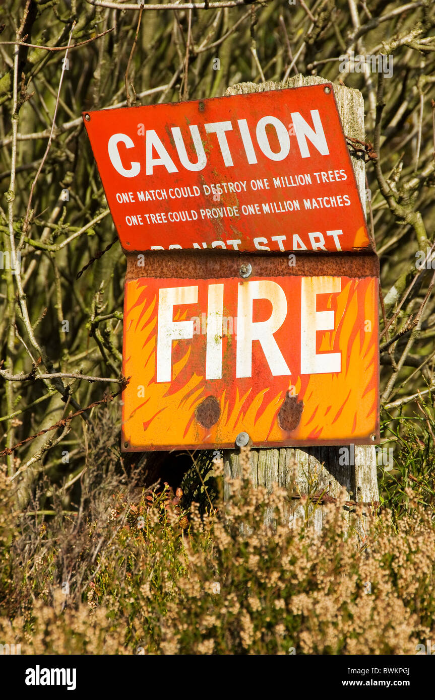 Close up of caution do not start fires sign warning signs in a woodland forest area North Yorkshire England UK United Kingdom GB Great Britain Stock Photo