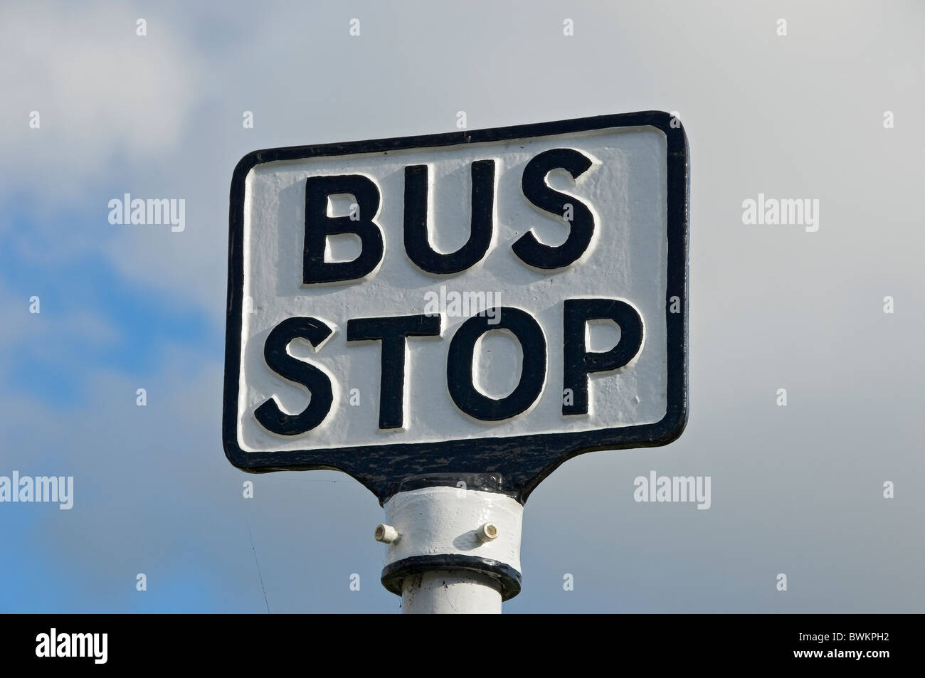 Close up of old metal bus stop traditional sign North Yorkshire England UK United Kingdom GB Great Britain Stock Photo