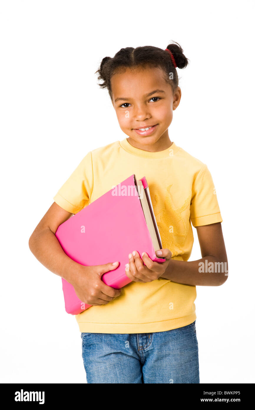 Portrait of happy child with textbook on a white background Stock Photo