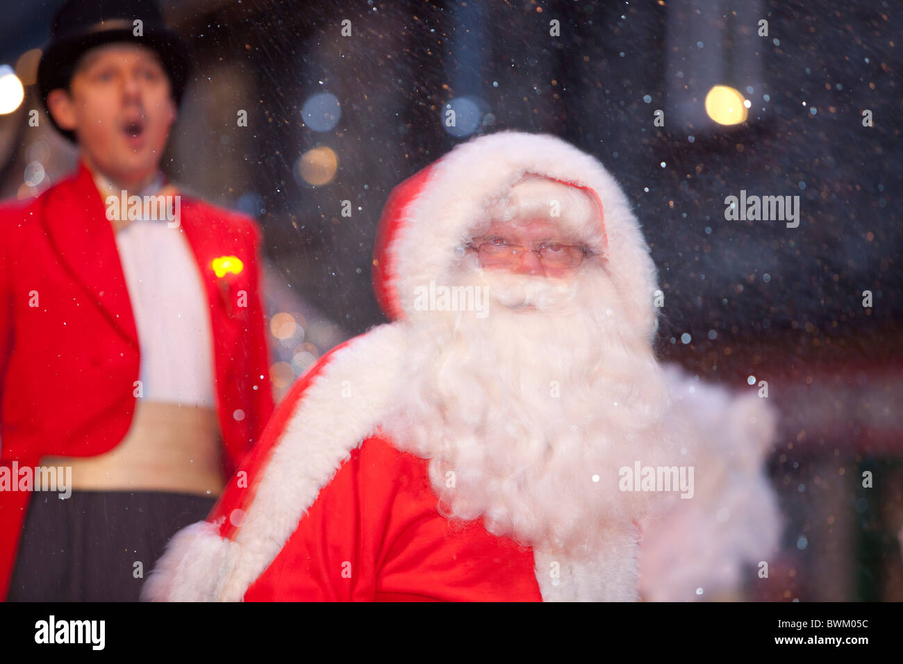 Father Christmas at the Christmas lights switch on in Ambleside, Cumbria, UK. Stock Photo
