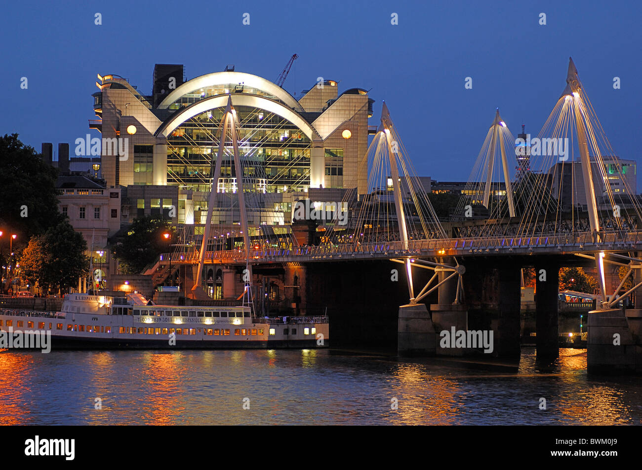 UK London Charing Cross Station Hungerford Bridge Strand Great Britain Europe England at night evening town Stock Photo