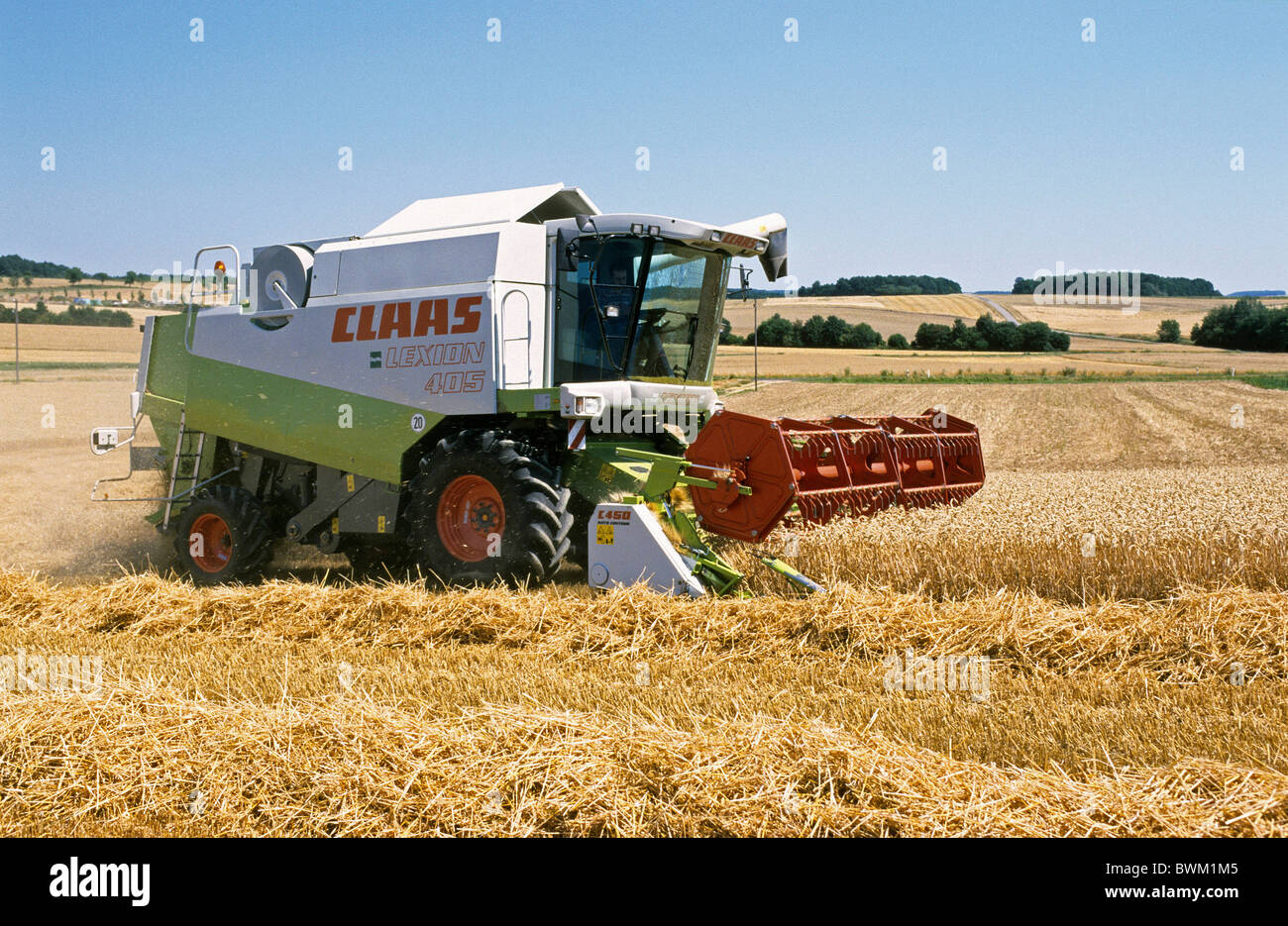 Combine harvester at work, Bavaria, Germany. Stock Photo
