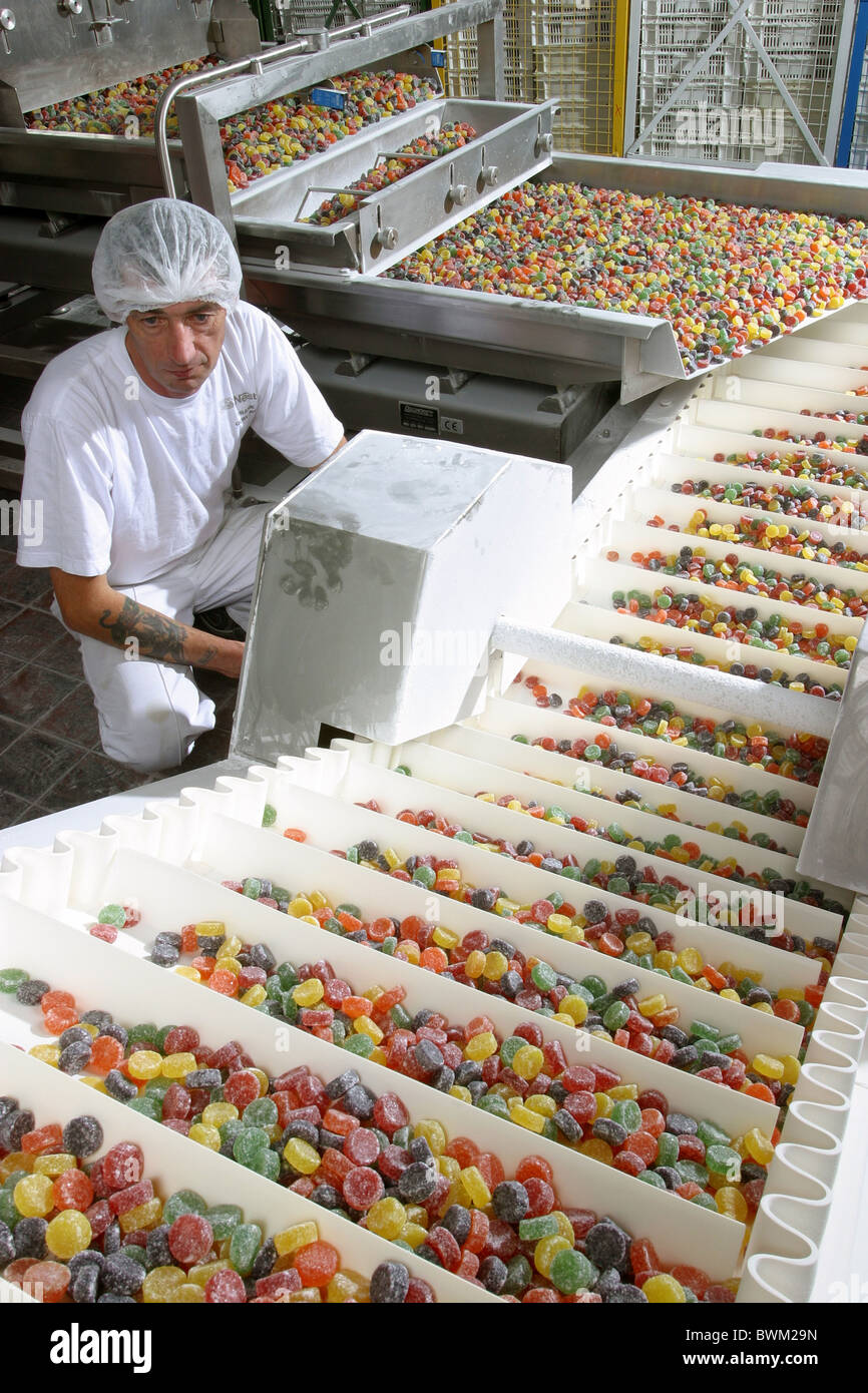 worker in a sweet factory Stock Photo Alamy