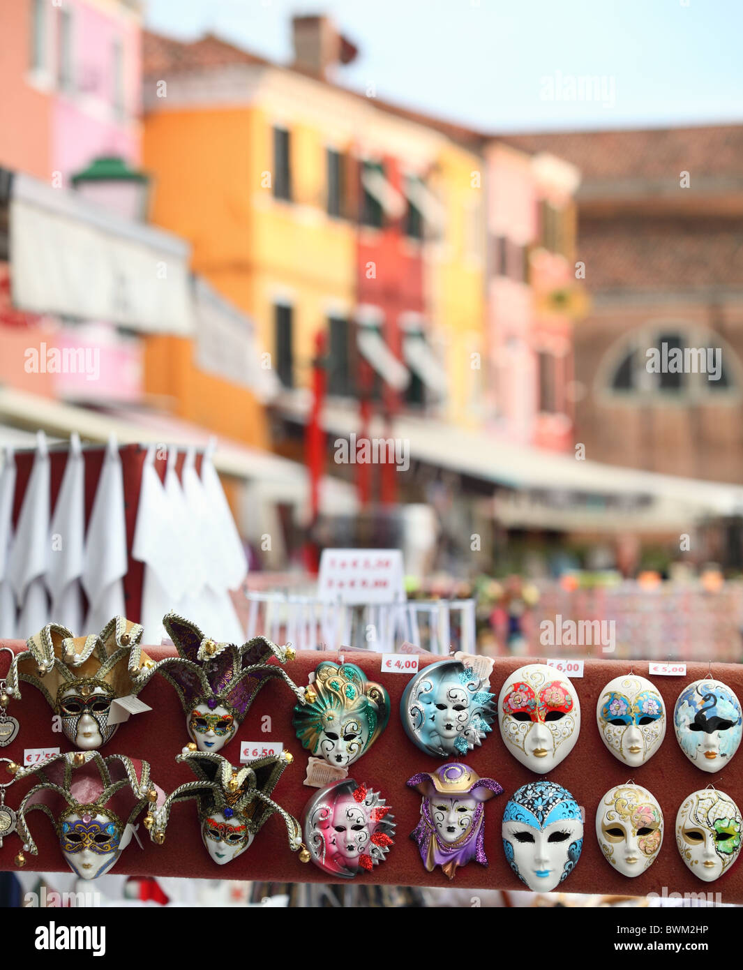 Miniature Venetian carnevale masks on sale on Burano island, which is part of the Venetian archipelago. Stock Photo