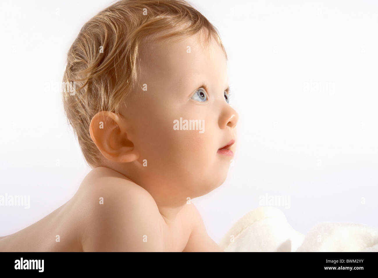 Baby boy 11 Months old toddler portrait child children one person blond blue eyes studio indoors portrait Stock Photo