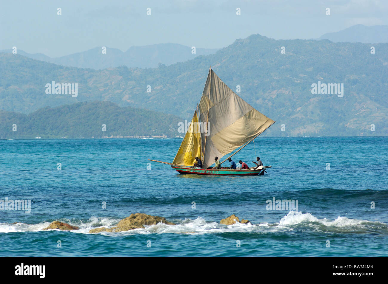 Haiti Labadee Caribbean Fishing Fisher Sailboat Boat Sea Ocean Coast Stock Photo