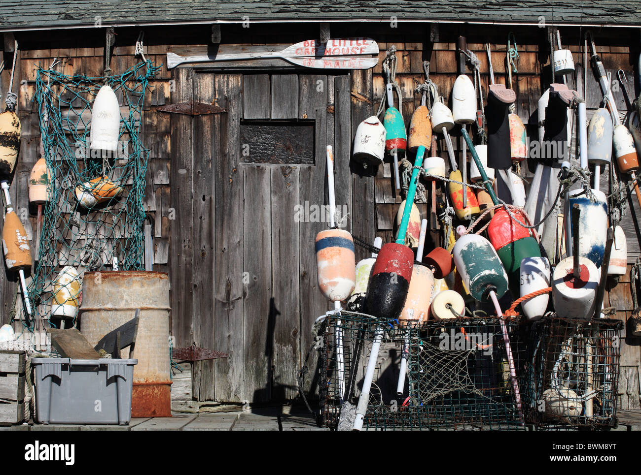 Fishing buoys or floats outside a fisherman's shack, Cape Neddick, Maine, USA Stock Photo