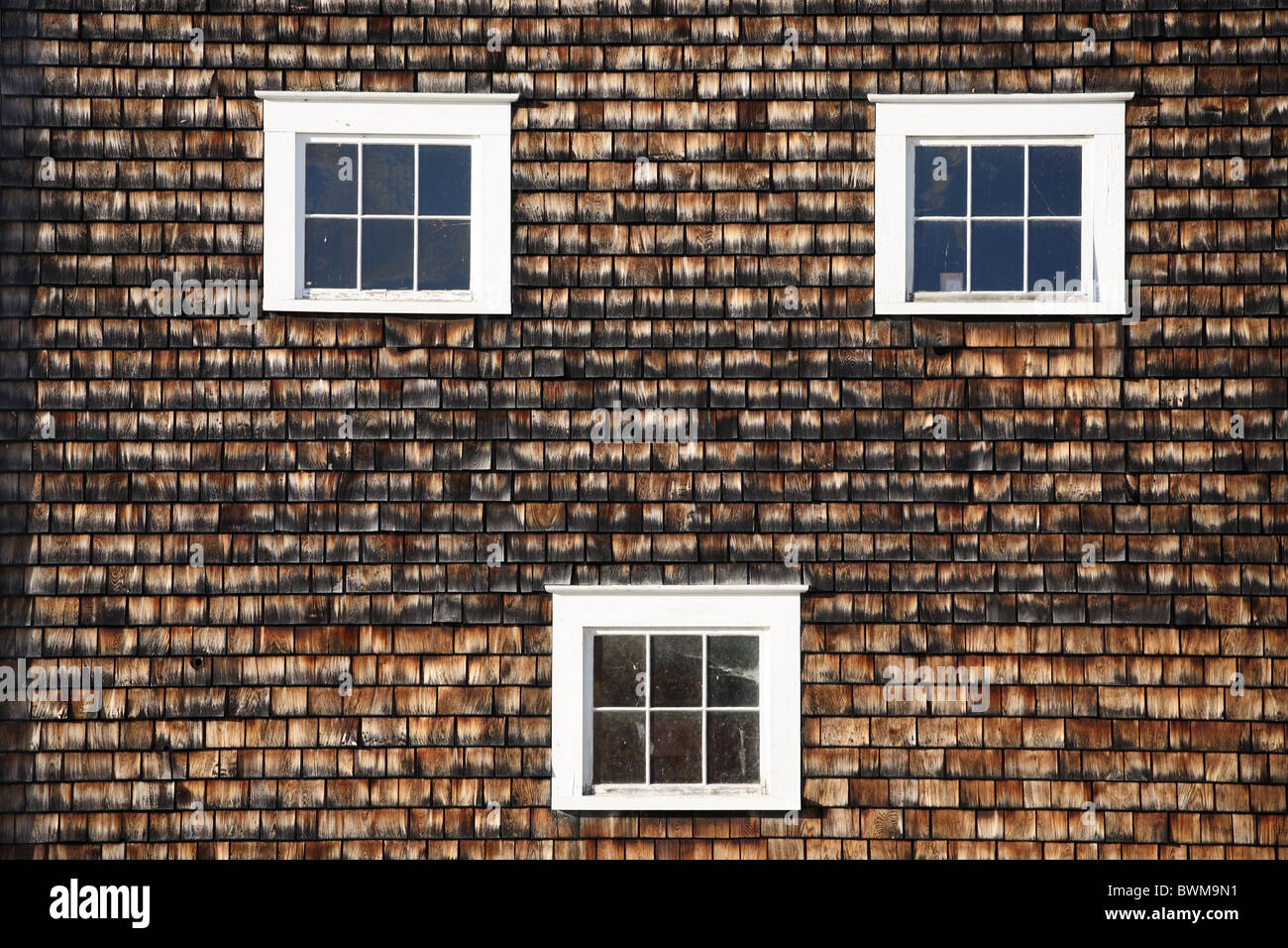 Window detail of the 1819 wood shingle covered horse barn. Canterbury Shaker Village, New Hampshire, USA Stock Photo