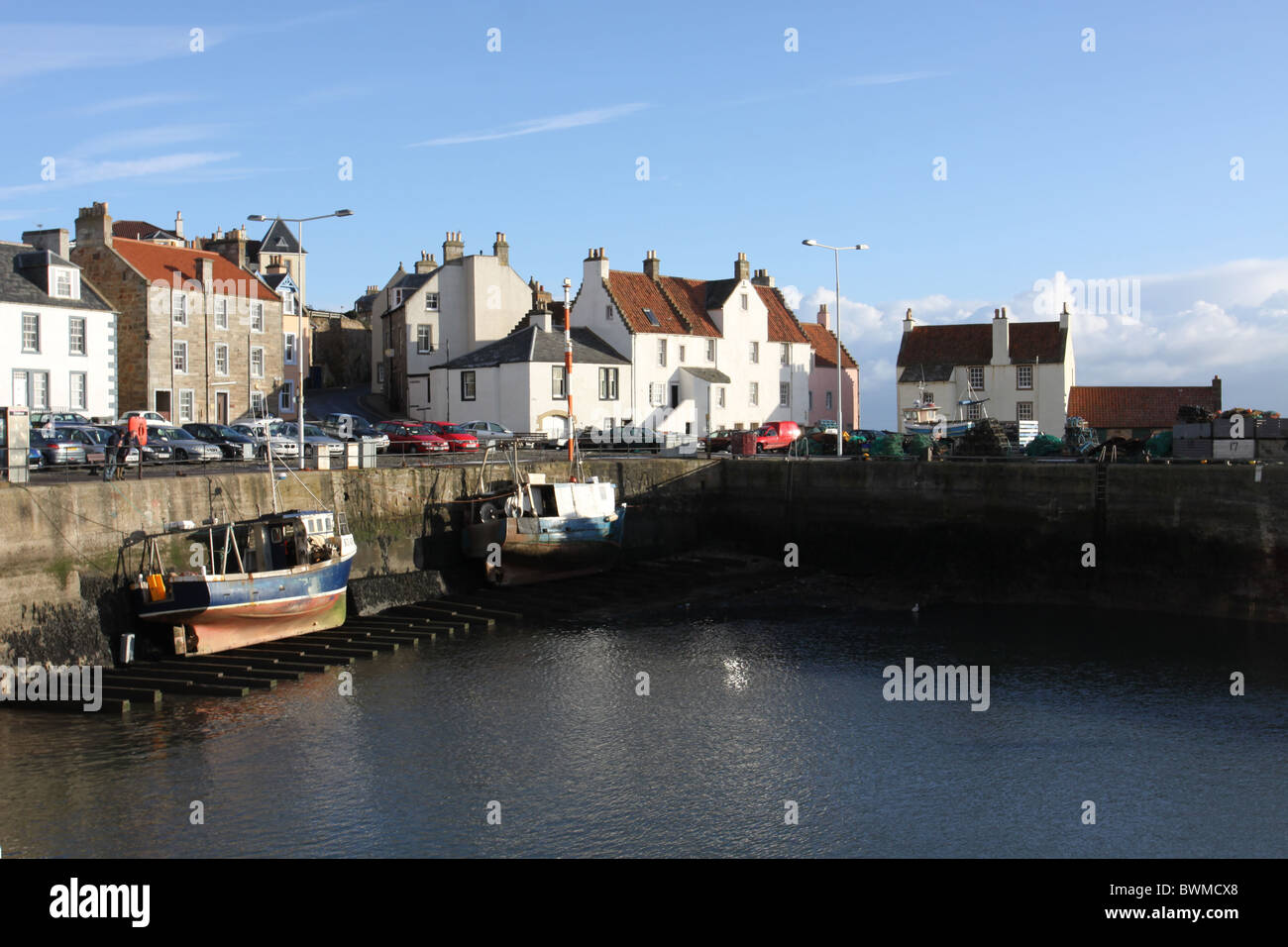 Pittenweem harbour with fishing boats at low tide Fife Scotland ...