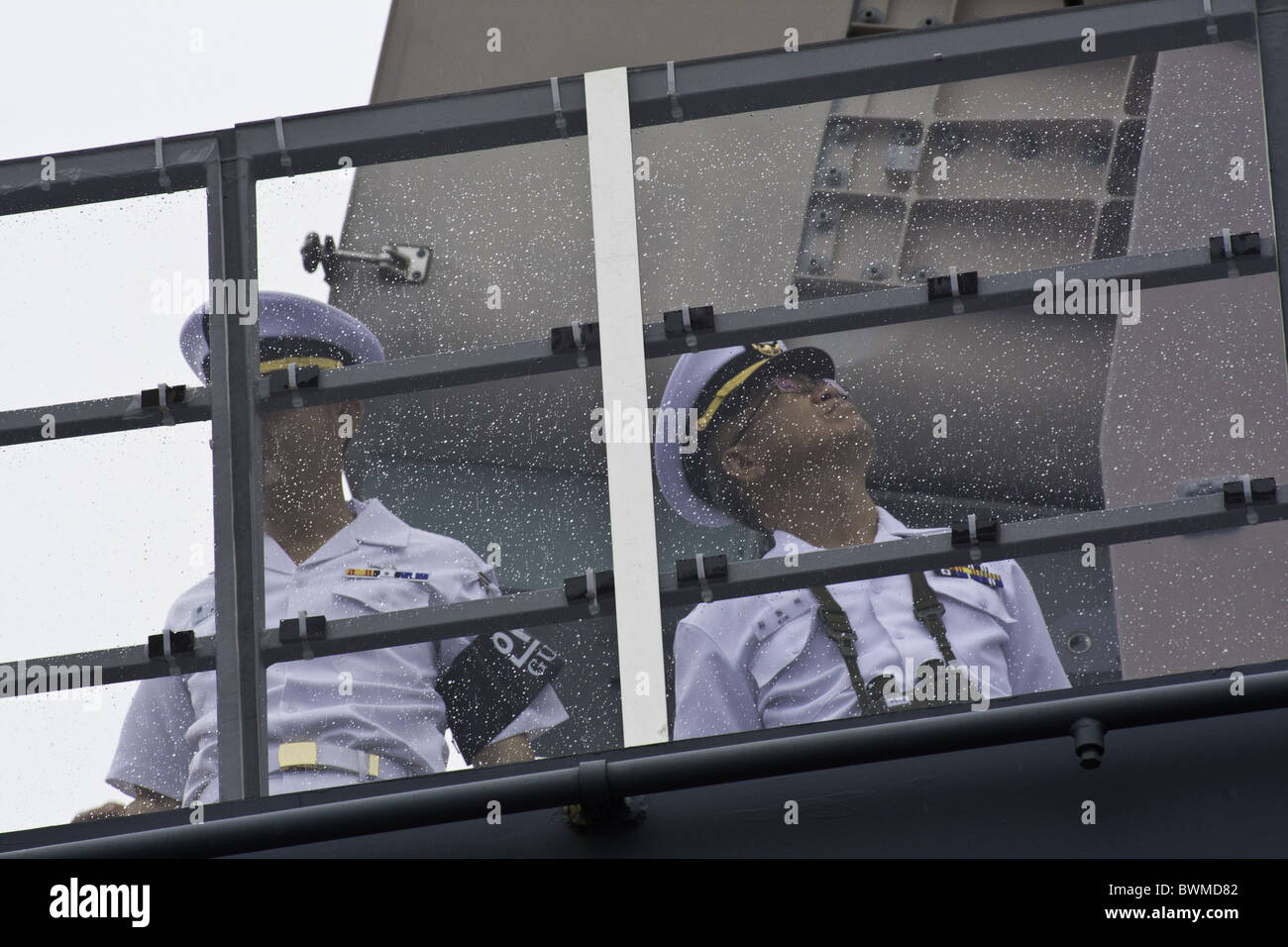 Korean Naval Officers on the Bridge of a War Ship Stock Photo