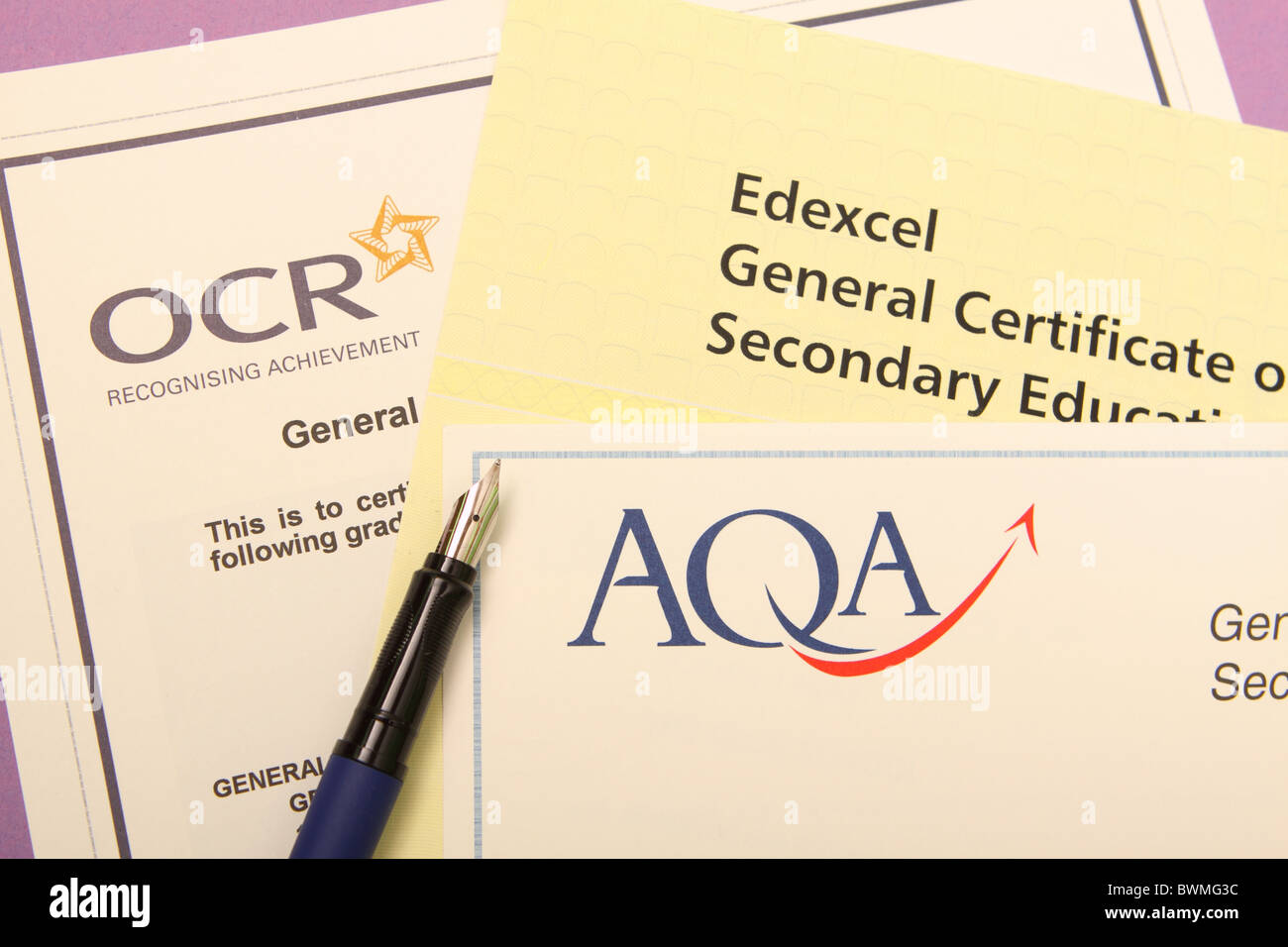 AQA Edexcel OCR exam board exam grade pass certificates Stock Photo - Alamy