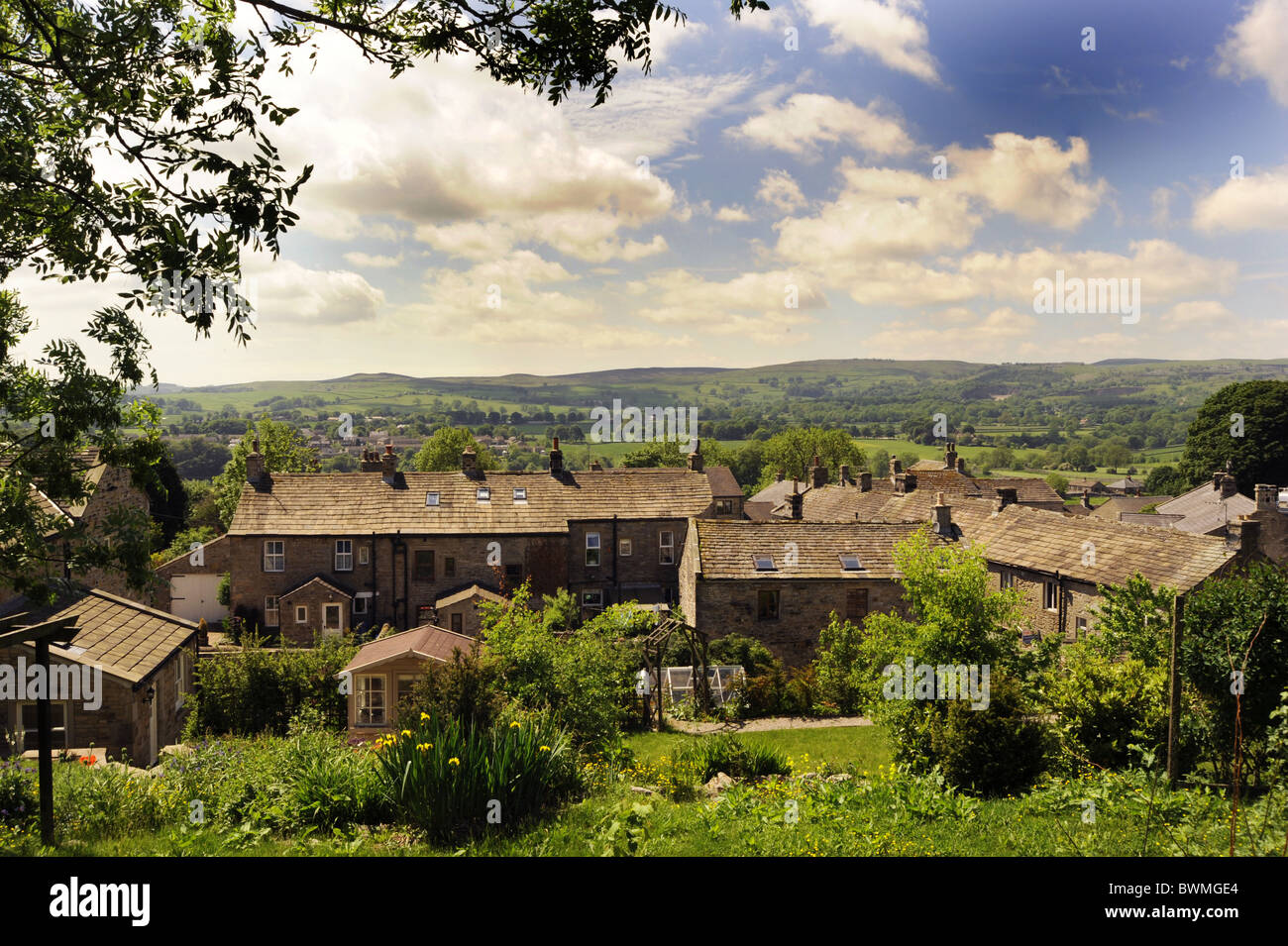 Rolling green hills and Houses in Grassington Village, Yorkshire Dales, North Yorkshire UK Stock Photo