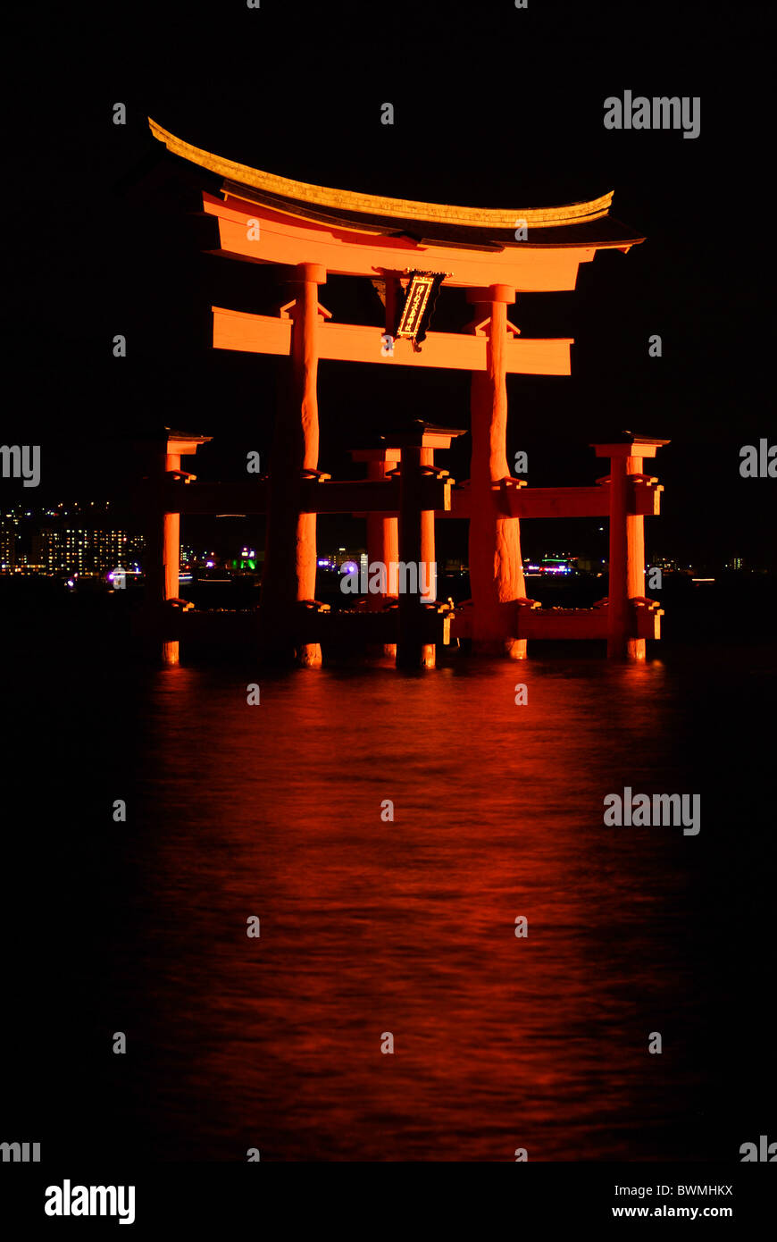 Itsukushima Shrine Torii Gate on Miyajima Island illuminated at night, Hiroshima Prefecture, Japan, Asia Stock Photo