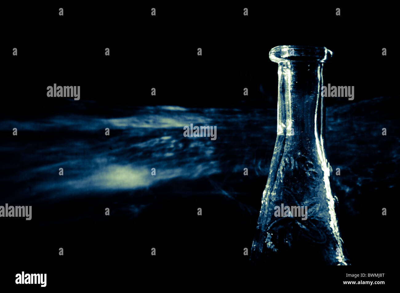 Evening light refractions through patterned glass Stock Photo