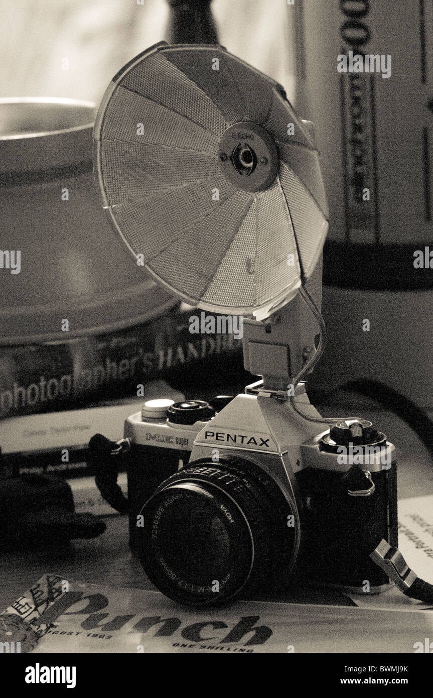 A Pentax ME film SLR with fold out flash Stock Photo Alamy