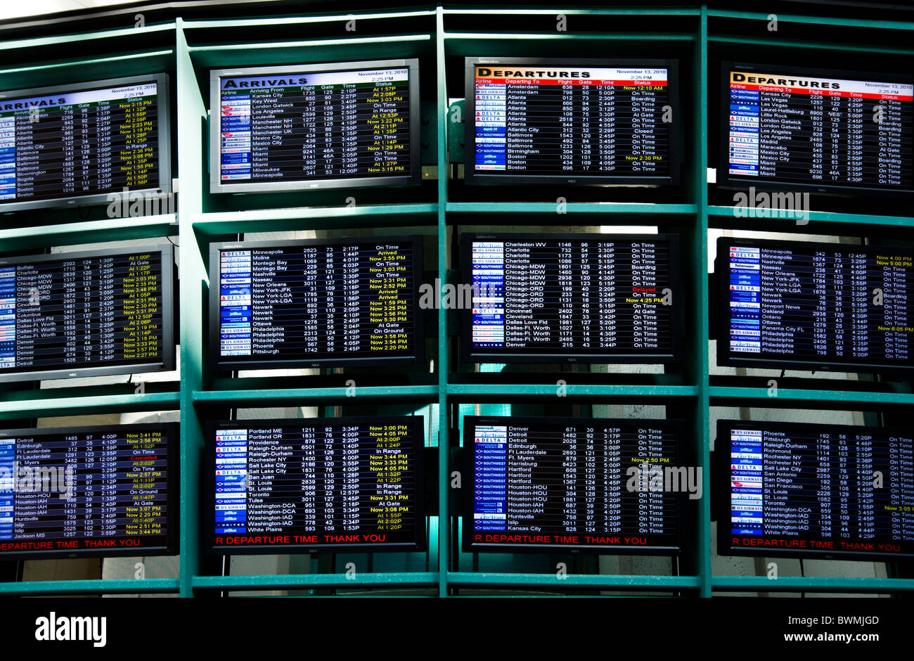 Flight Arrivals and Departures boards at Orlando International Airport, Florida, USA Stock Photo