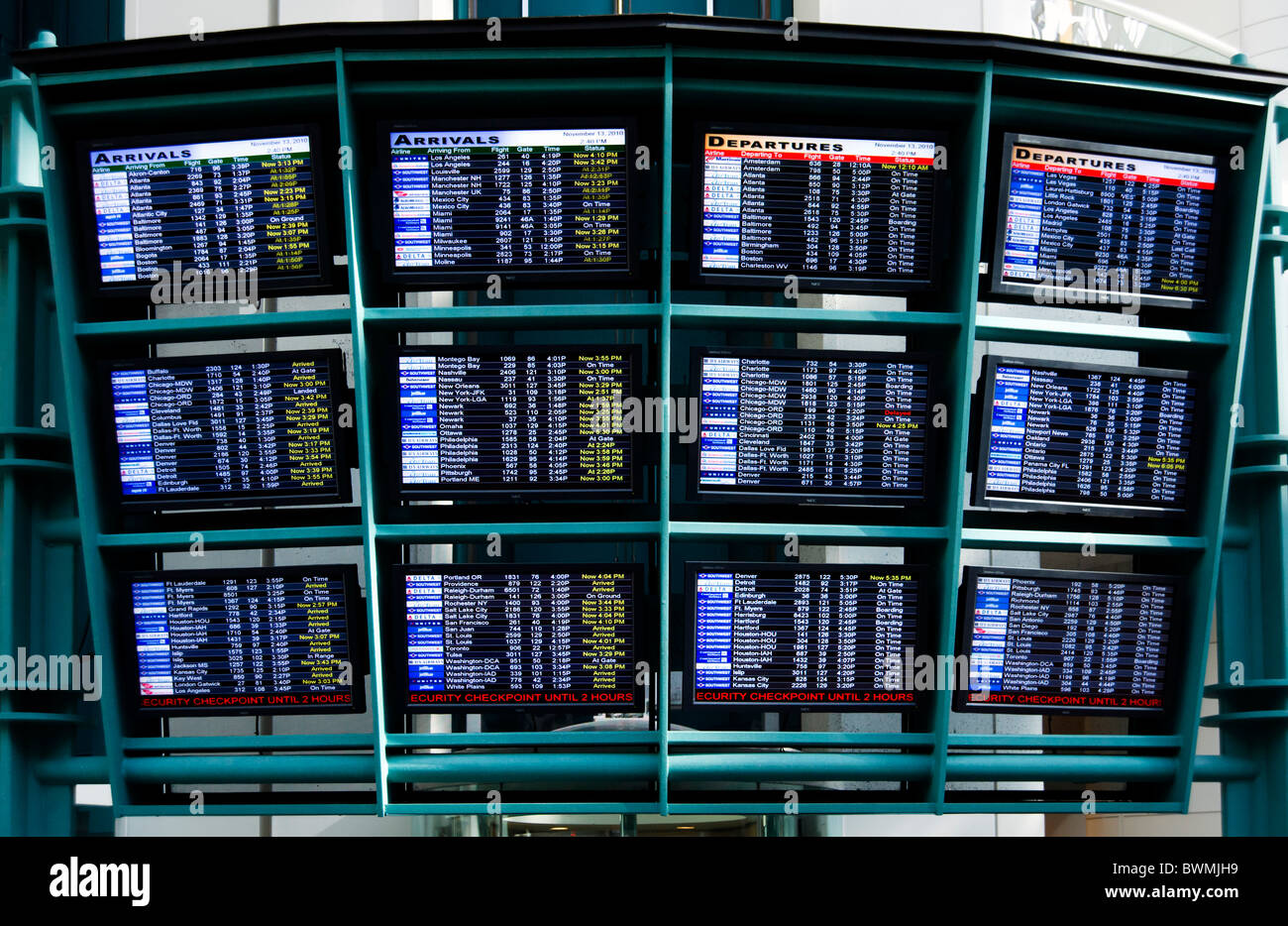 Flight Arrivals and Departures boards at Orlando International Airport, Florida, USA Stock Photo