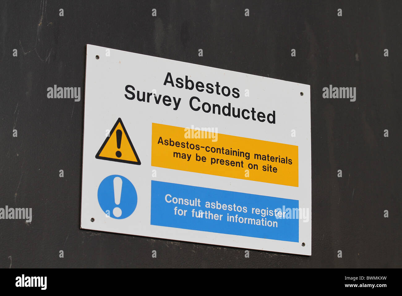 Sign warning of possible contamination of an area with Asbestos Stock