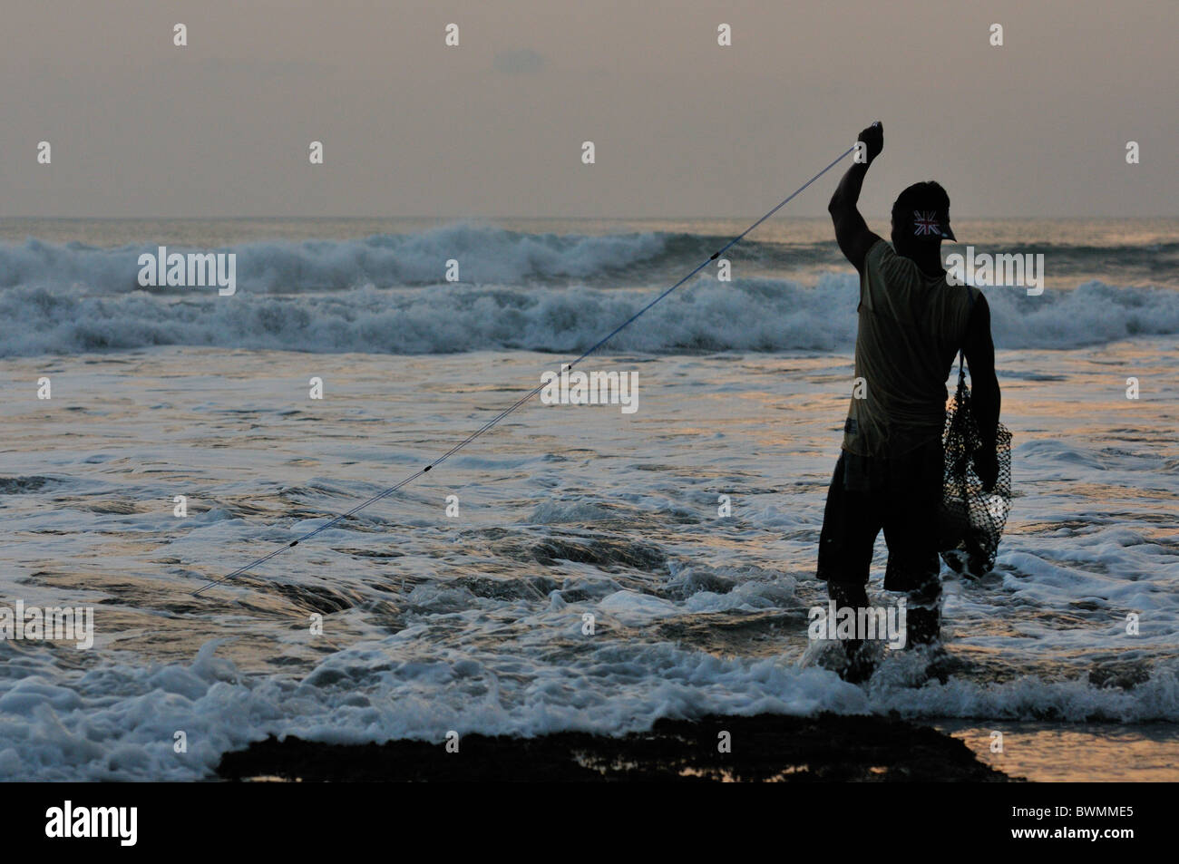 Fisherman near Tanah Loth Temple, Bali, Indonesia, Asia landscapes landscapes  Roberto Nistri horizontal Stock Photo