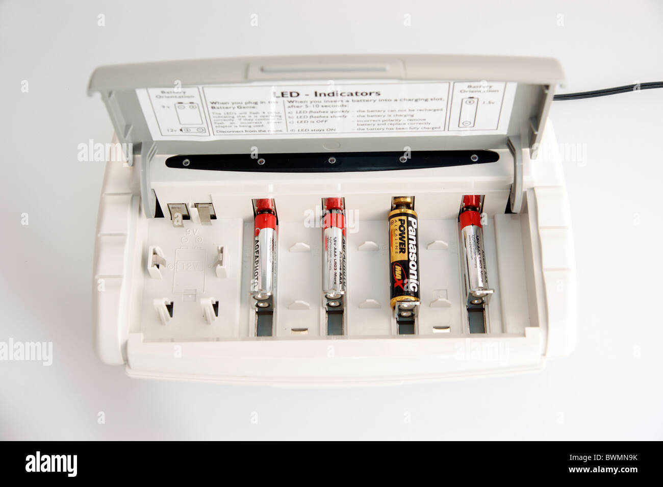 battery charger charging ordinary batteries helping the environment