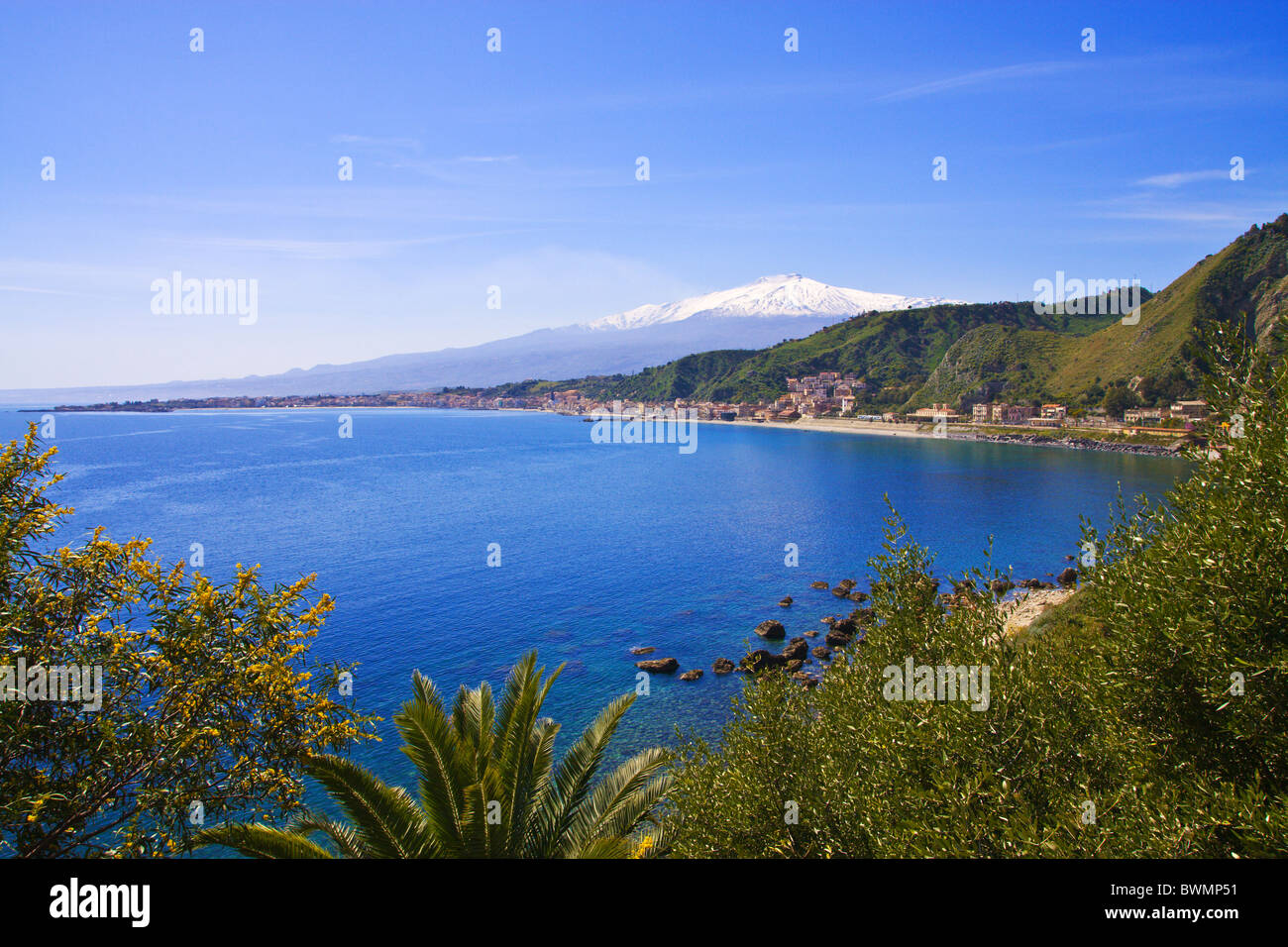 Etna Volcano in Sicily, Italy seen from Taormina. Blue sea on foreground. Stock Photo