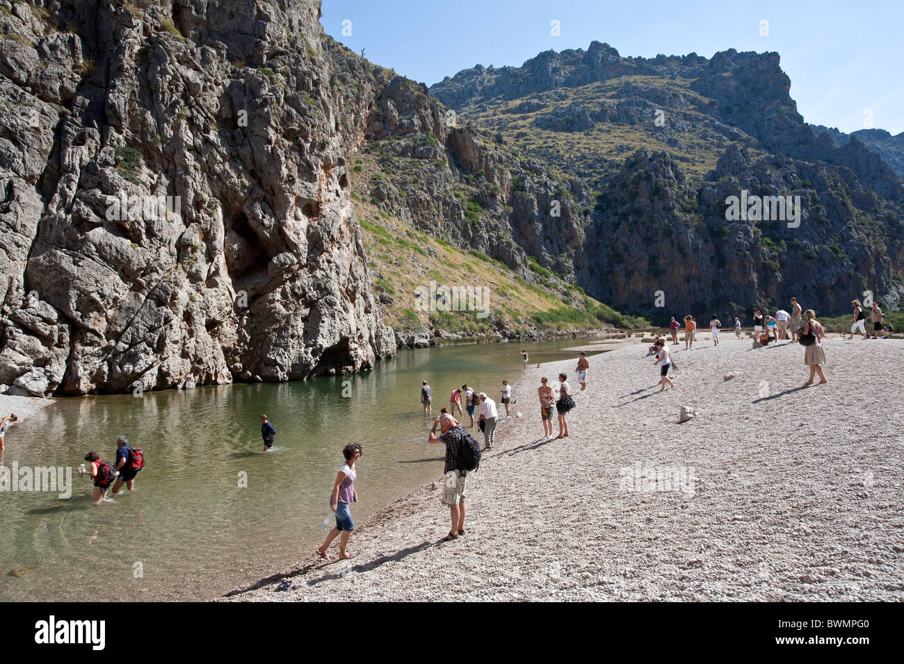 Tourists visiting Torrent de Pareis. Sa Calobra. Mallorca Island. Spain Stock Photo