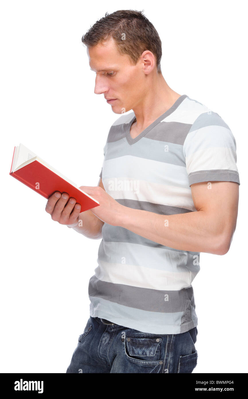 Full isolated studio picture from a young man with book Stock Photo - Alamy