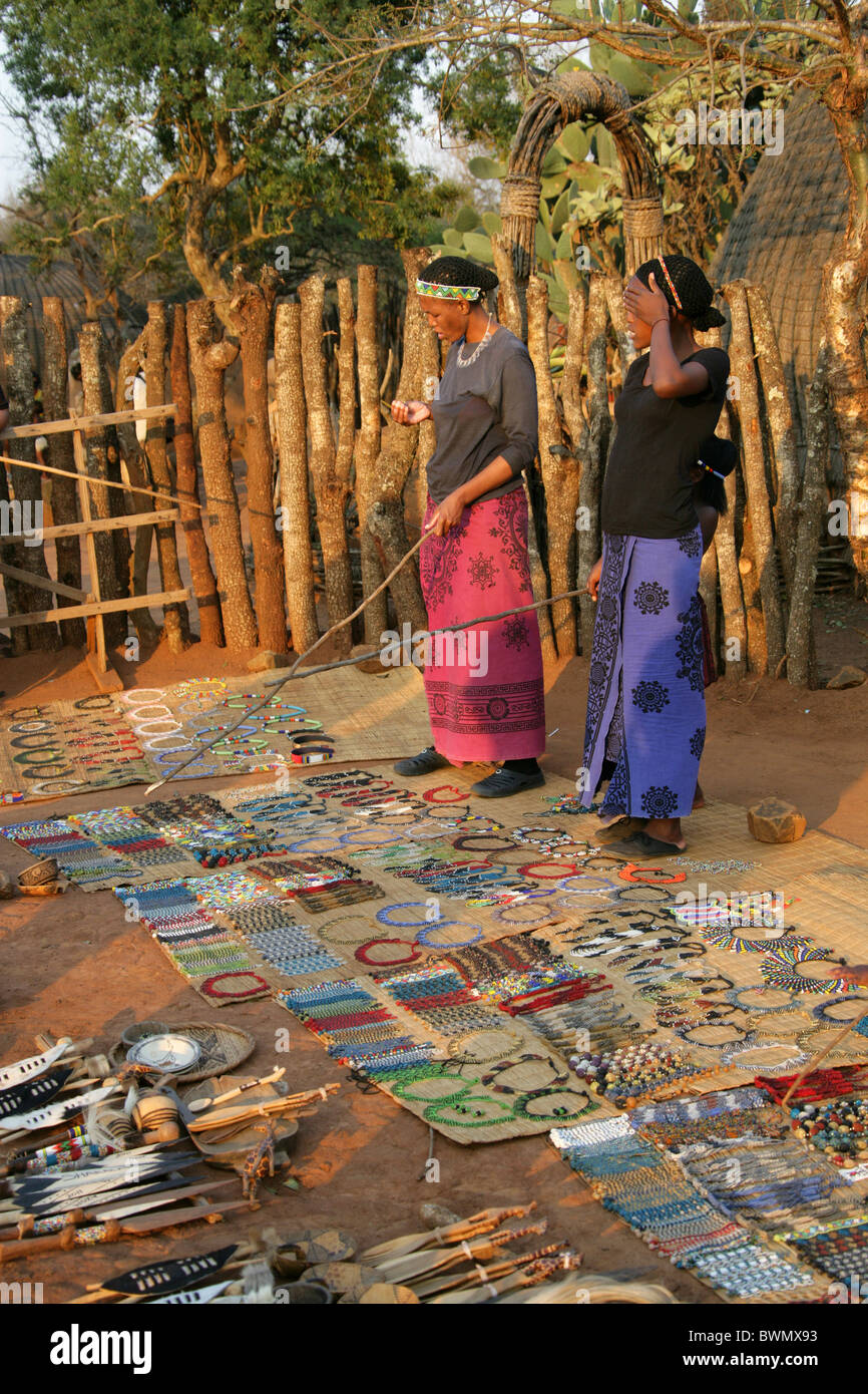 Zulu Women Selling Souvenirs to Tourist Guests, Shakaland Zulu Village, Nkwalini Valley, Kwazulu Natal, South Africa. Stock Photo