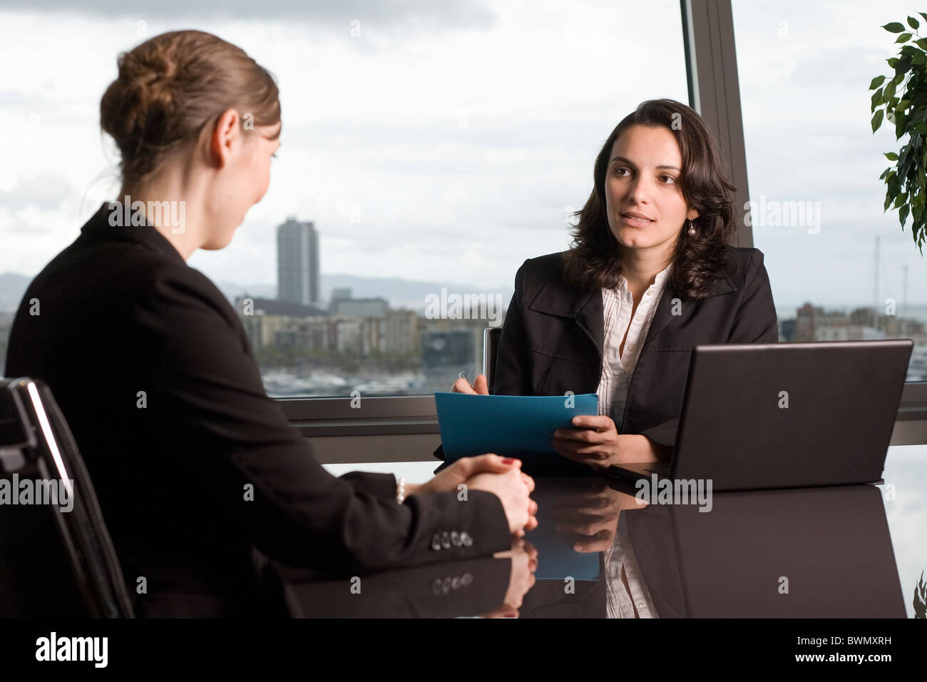 Young woman coming to a job interview Stock Photo