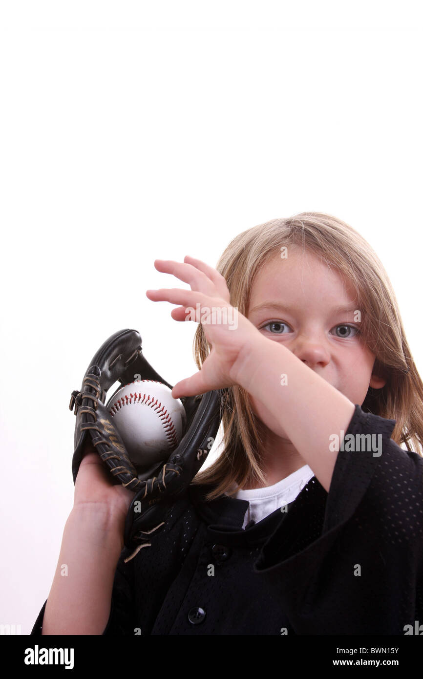 Young umpire girl throwing a baseball Stock Photo Alamy