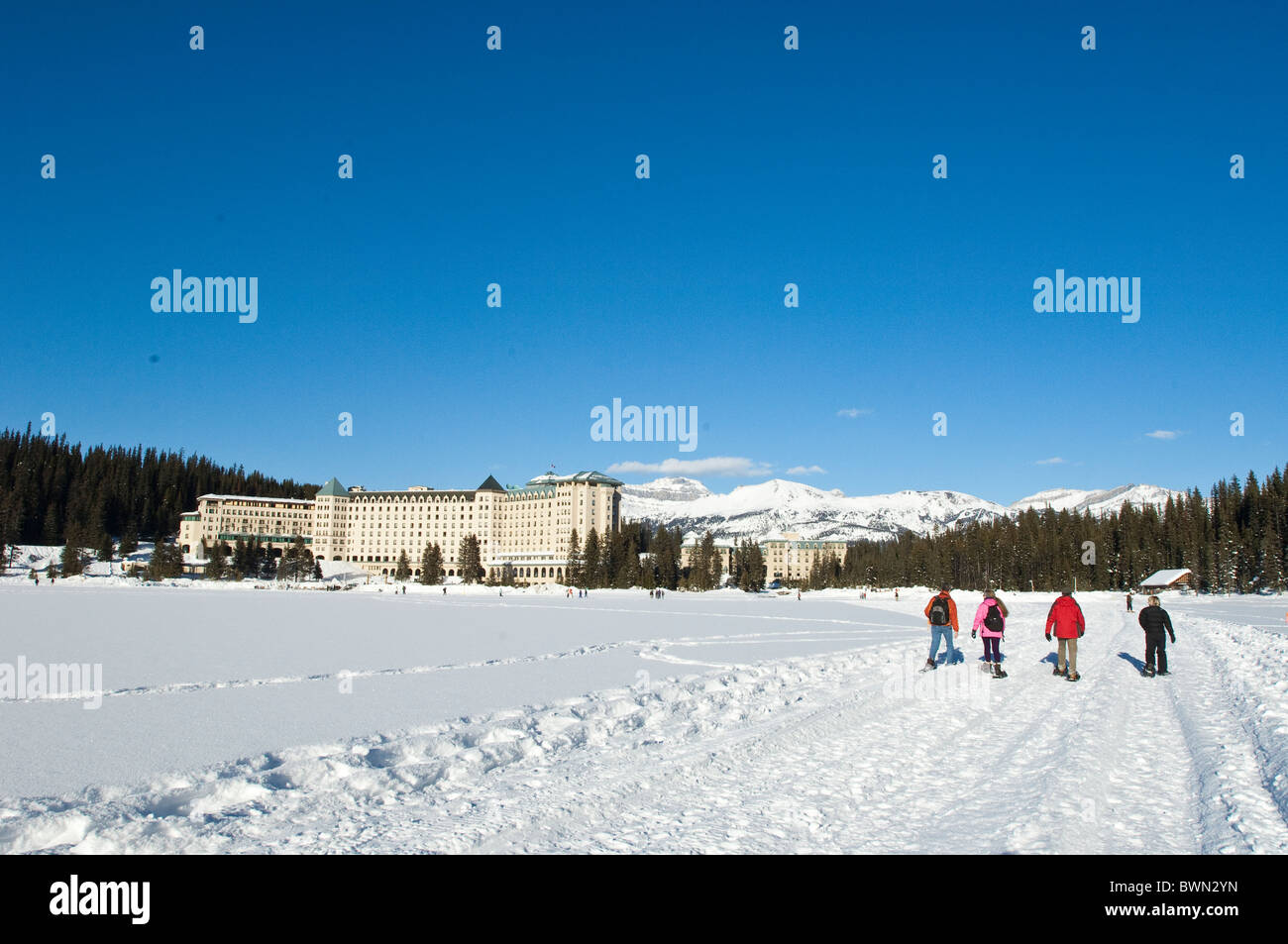 Snowshoeing at Chateau Lake Louise Hotel, Lake Louise, Banff National Park, Alberta, Canada. Stock Photo