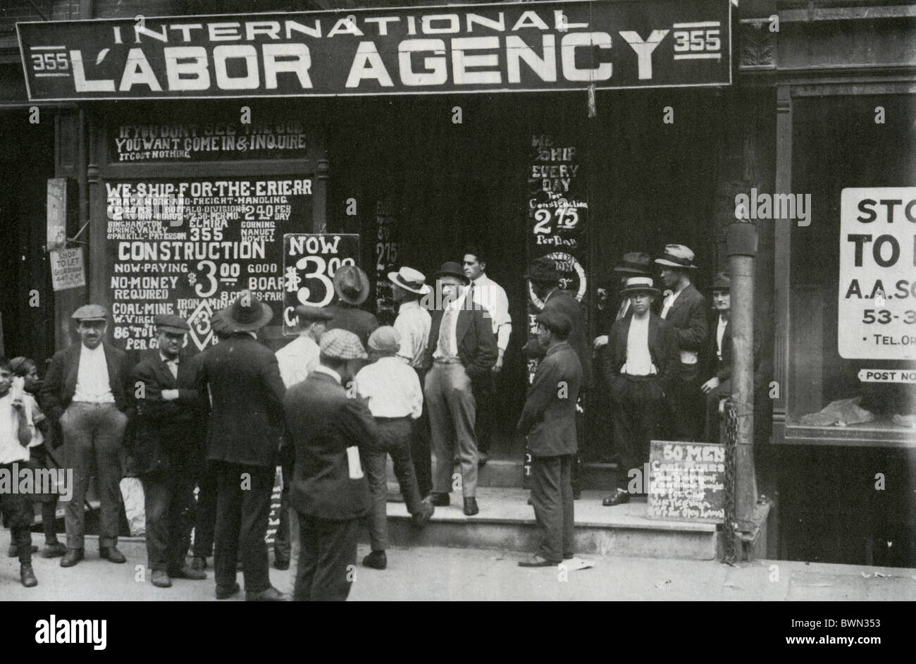JOB AGENCY in New York, 1910. Most adverts relate to coal mining and construction. Photo by Lewis Hine Stock Photo