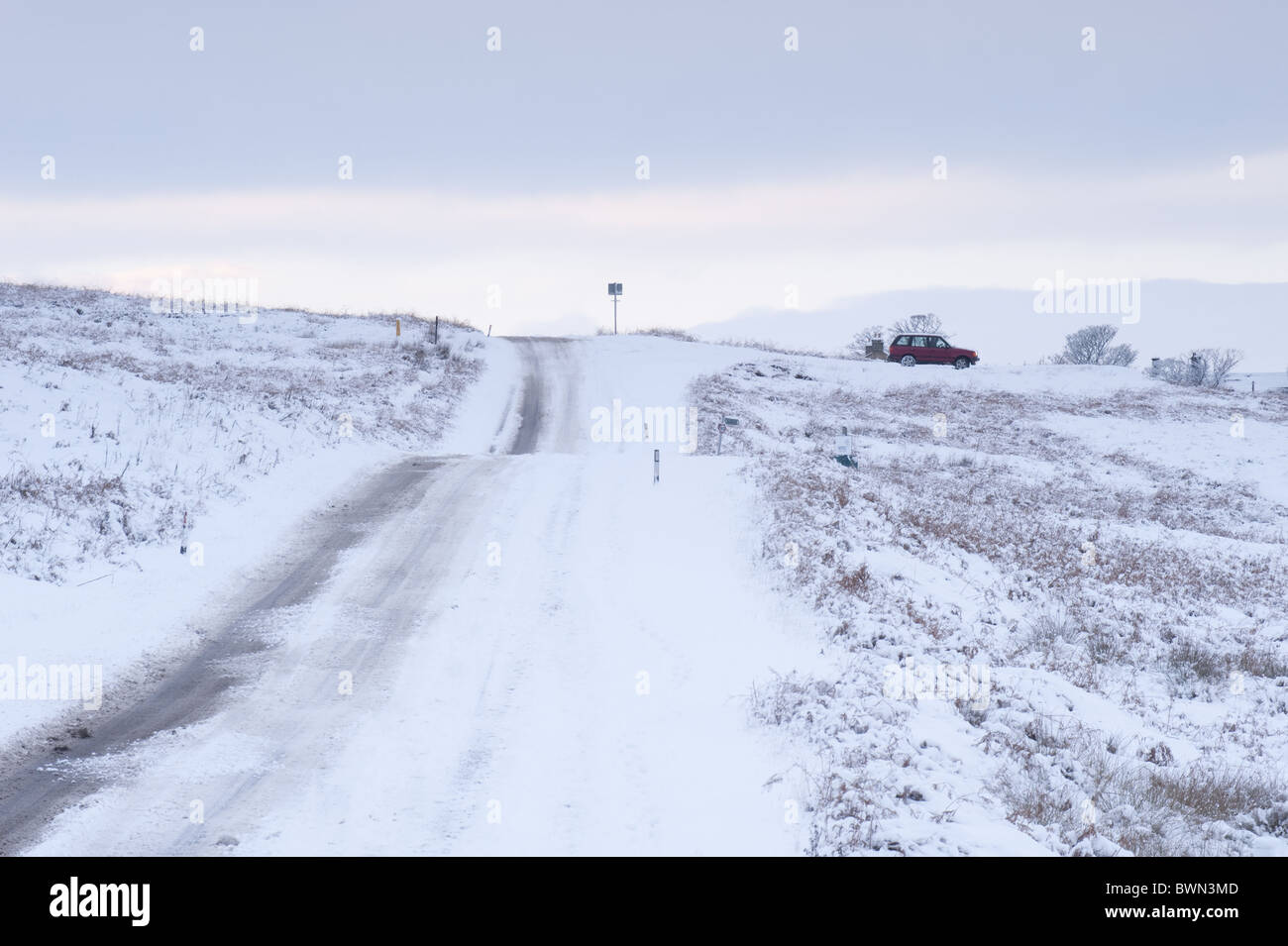 A snowcovered road on the edges of Ilkley Moor Stock Photo Alamy