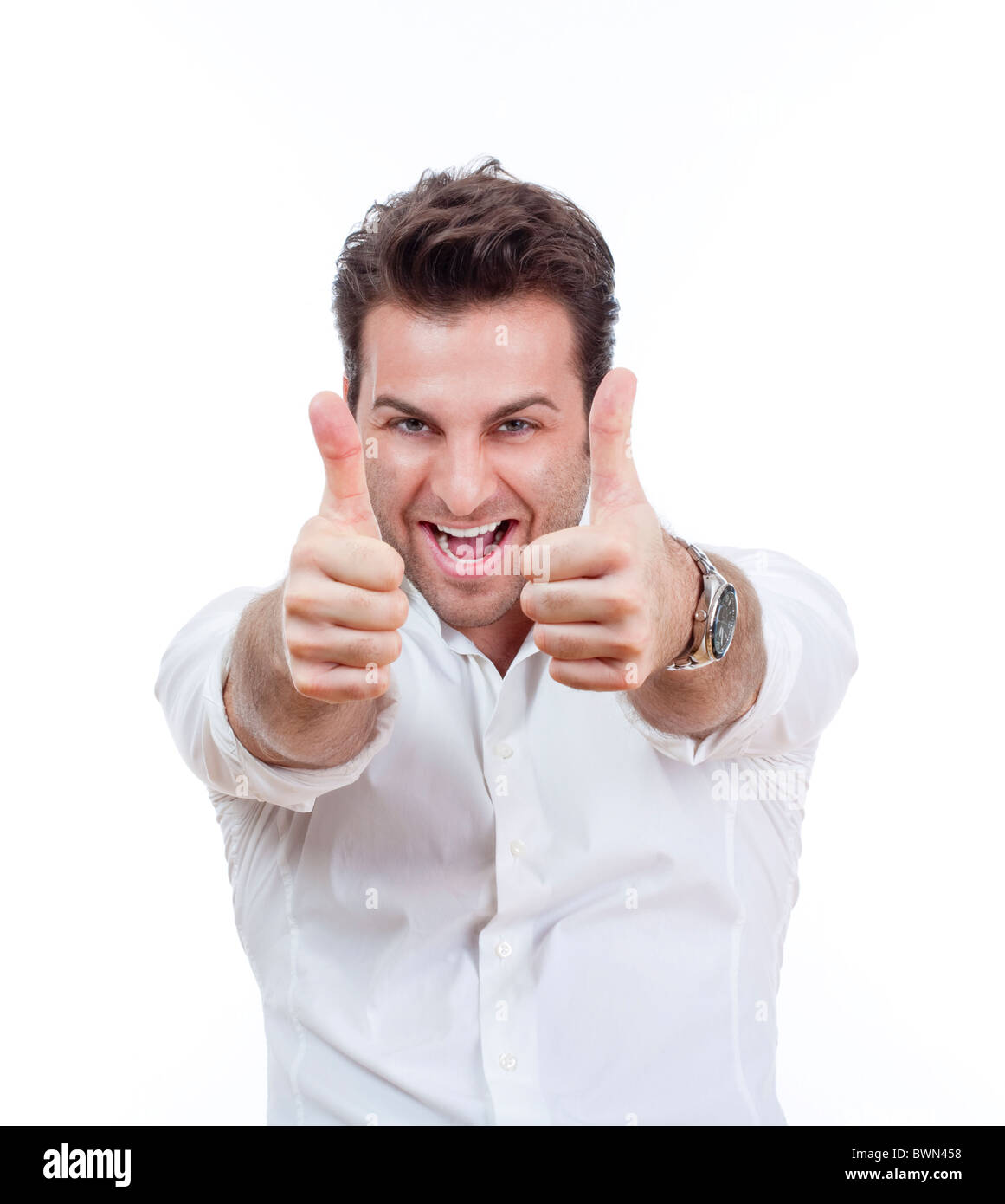 excited man laughing holding his both thumbs up - isolated on white Stock Photo