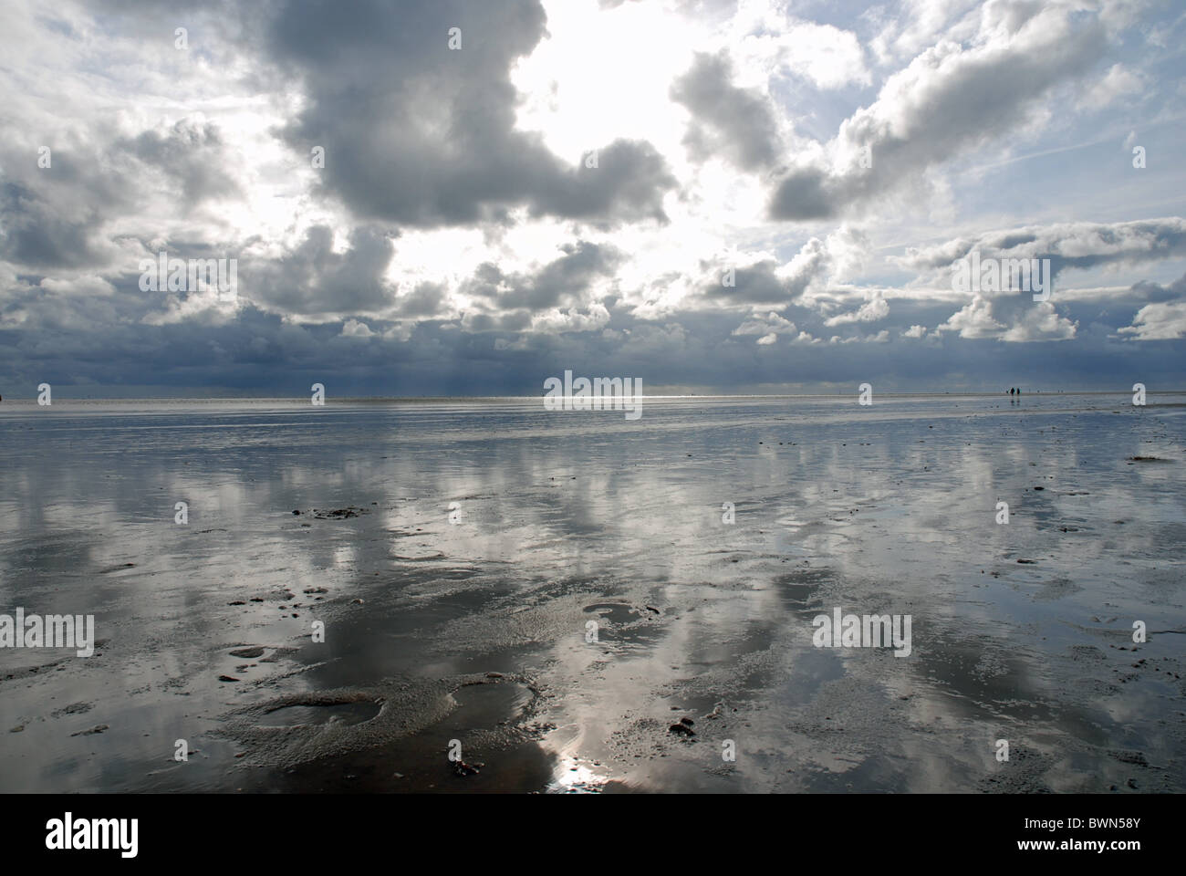 Germany Europe German Bight Europe ebb tide flood tide tides tidal mudflat sky coast coastal landscape Stock Photo