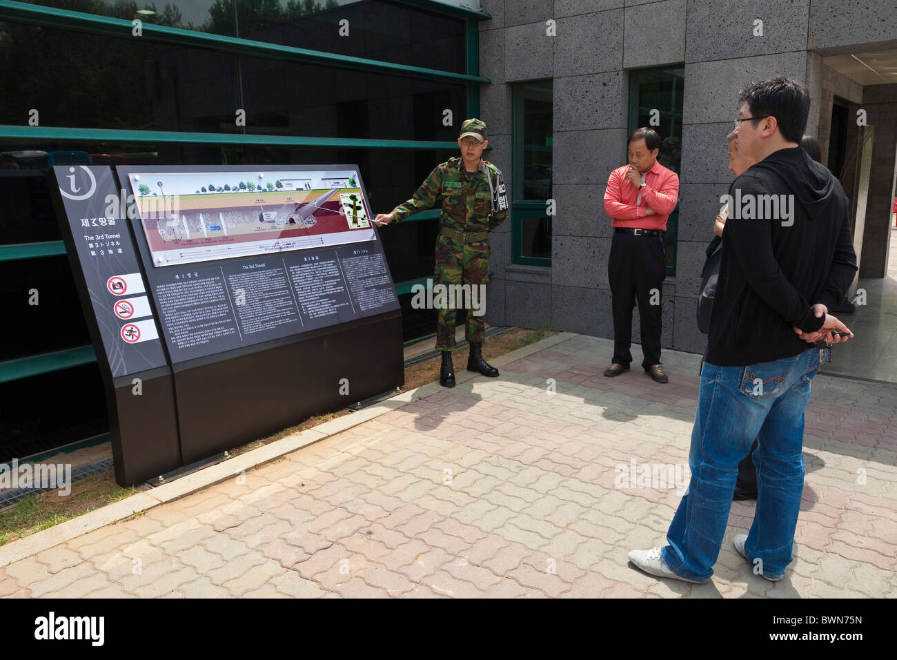 South Korean soldier explains the Third Tunnel to visitors to the DMZ Demilitarized Zone Panmunjeom South Korea. JMH3800 Stock Photo